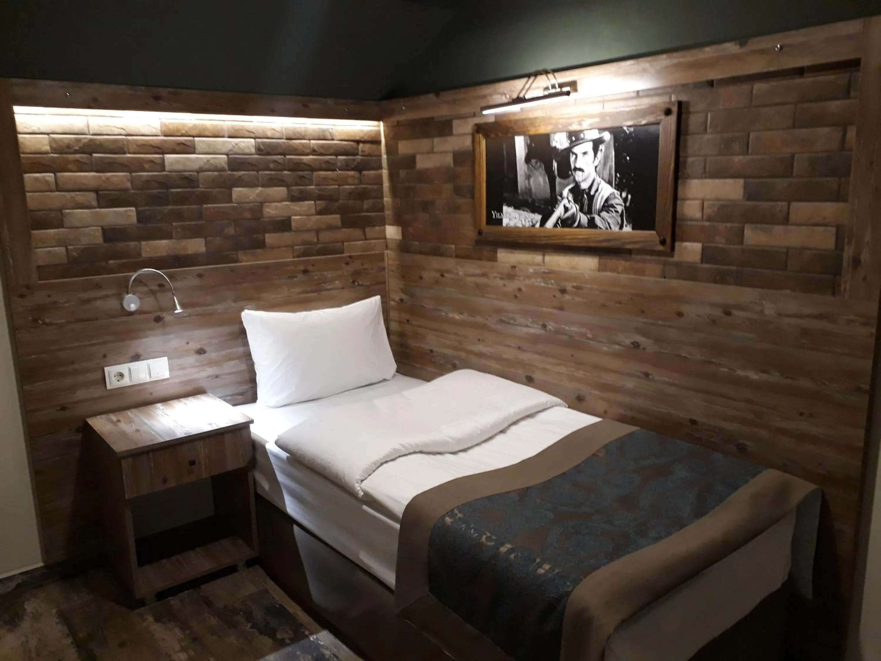 Bed in THE SARIGERME INN