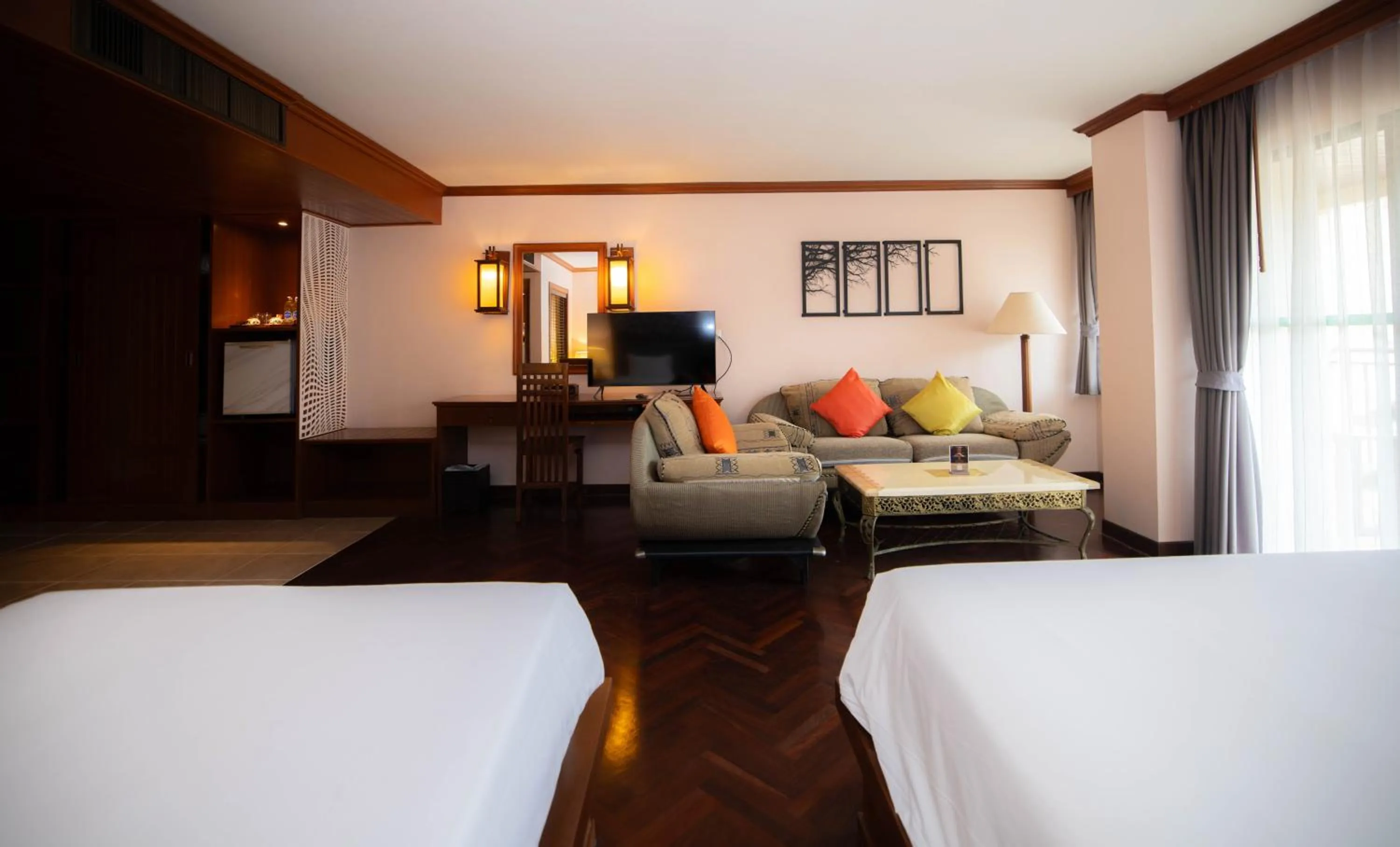 Bed in Baumanburi Hotel Patong