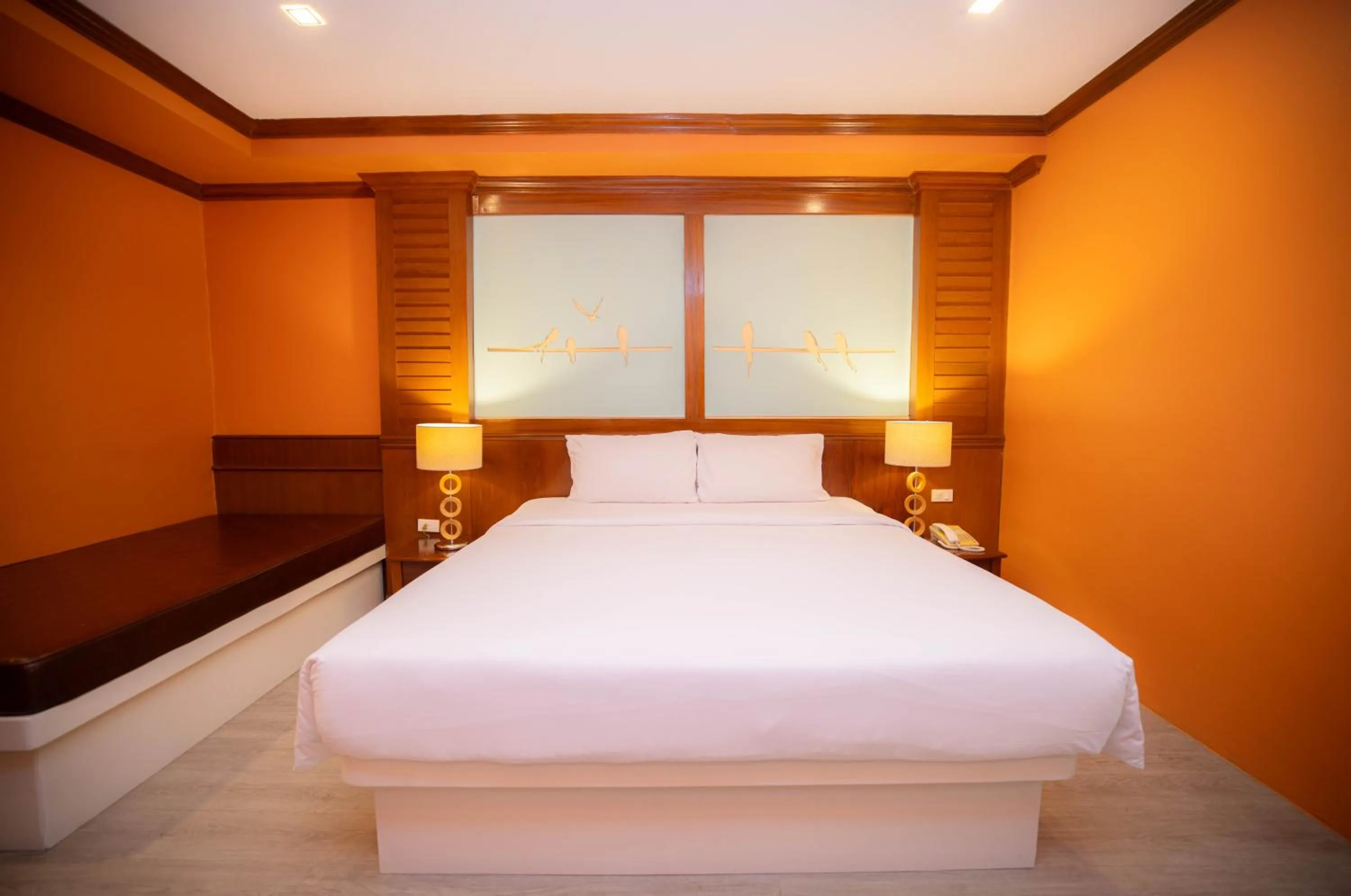 Bed in Baumanburi Hotel Patong