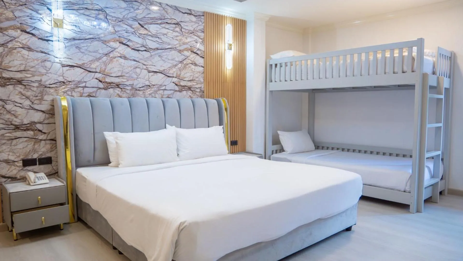 Bed in Baumanburi Hotel Patong