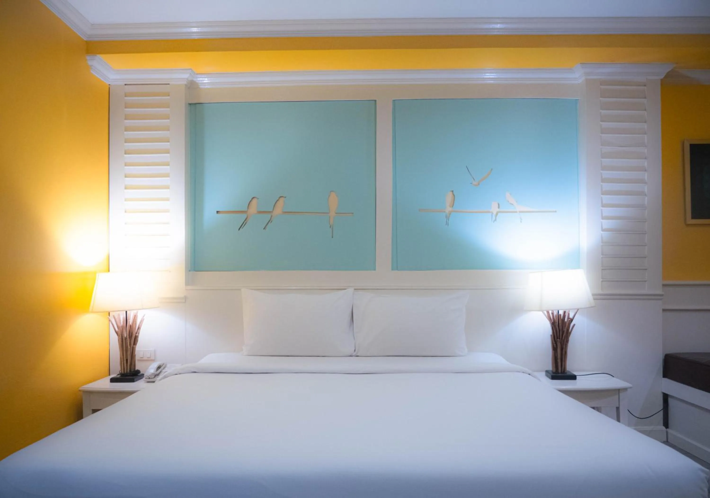 Bed in Baumanburi Hotel Patong