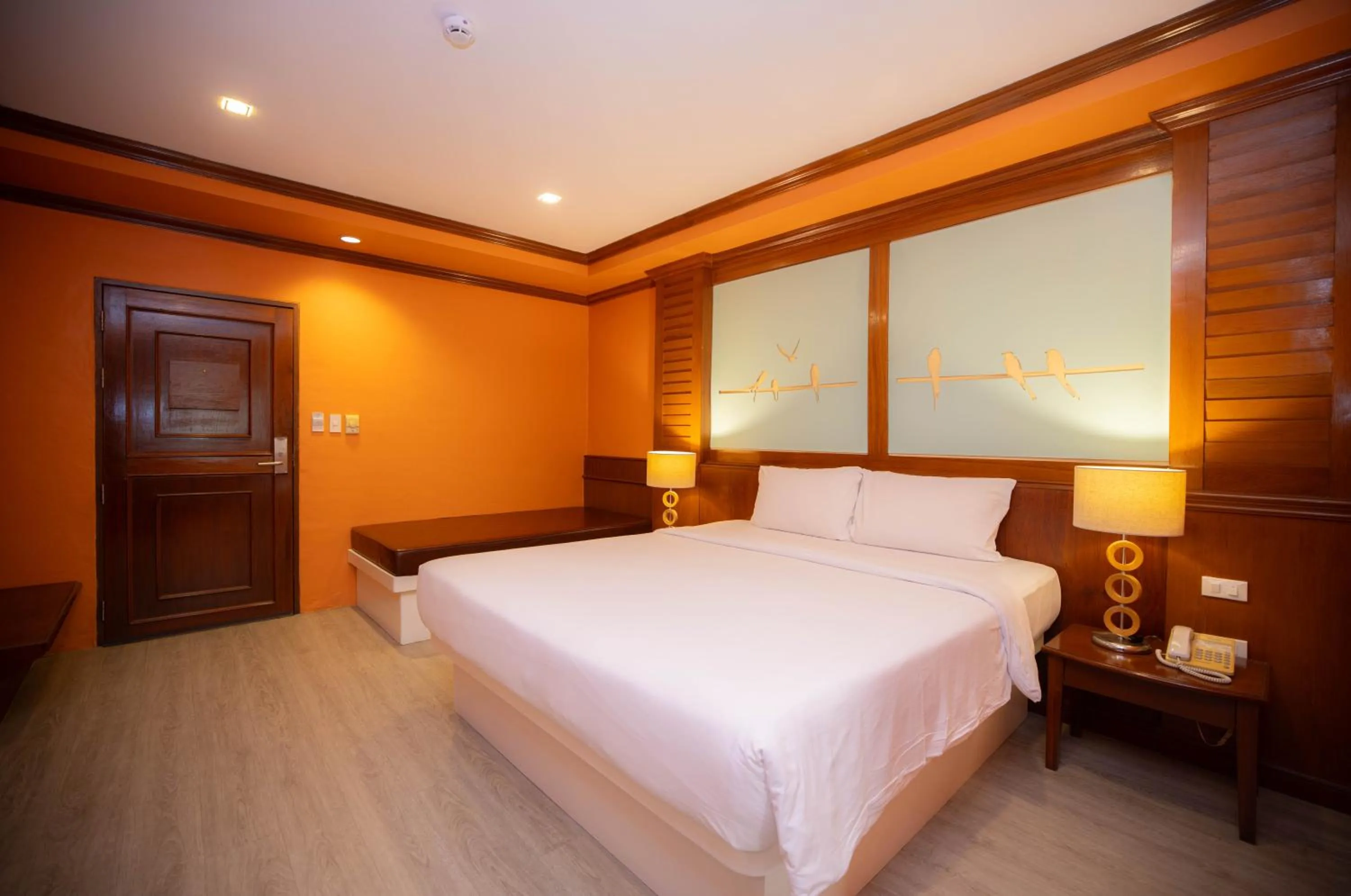Bed in Baumanburi Hotel Patong