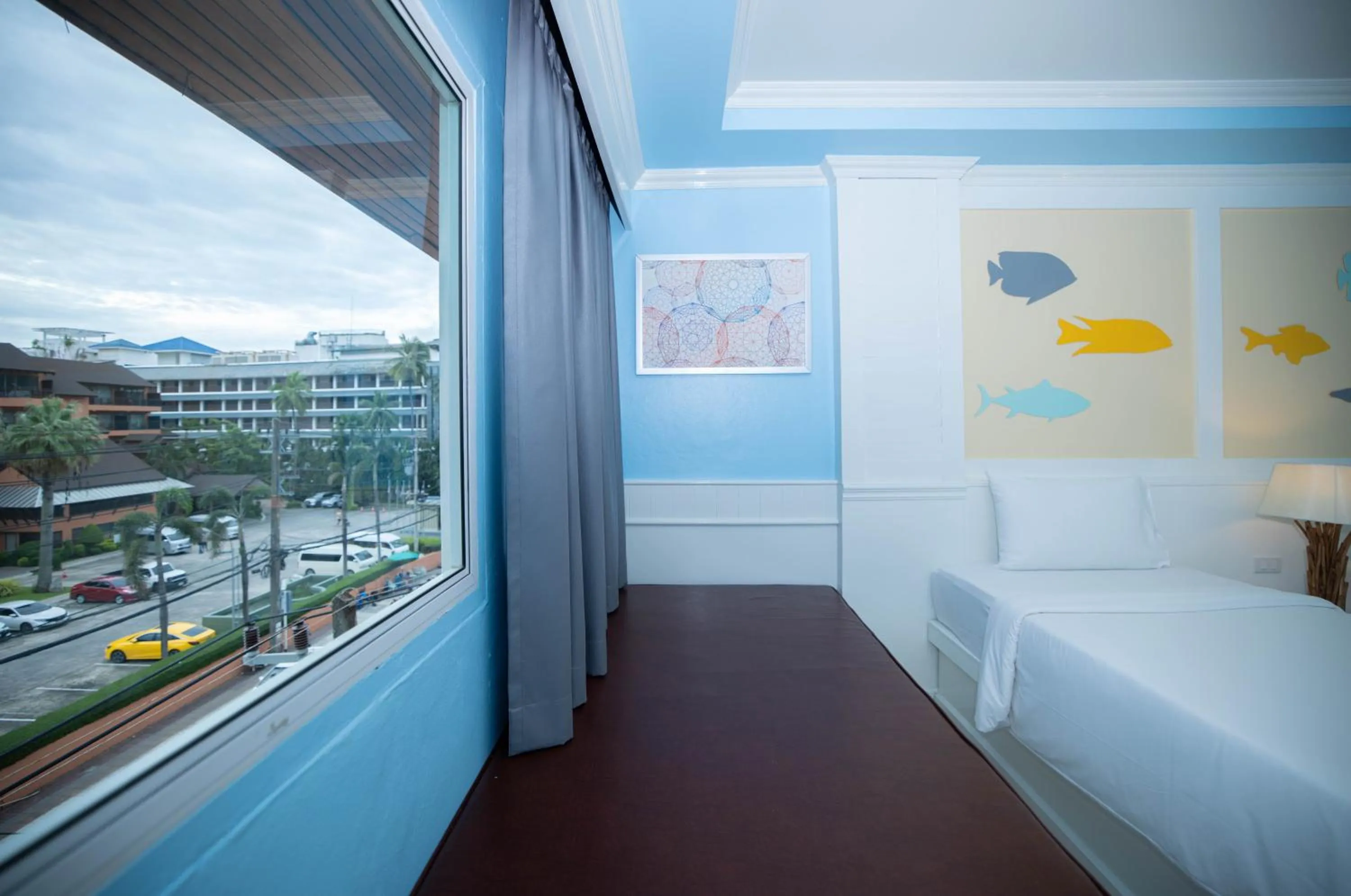 Bed in Baumanburi Hotel Patong