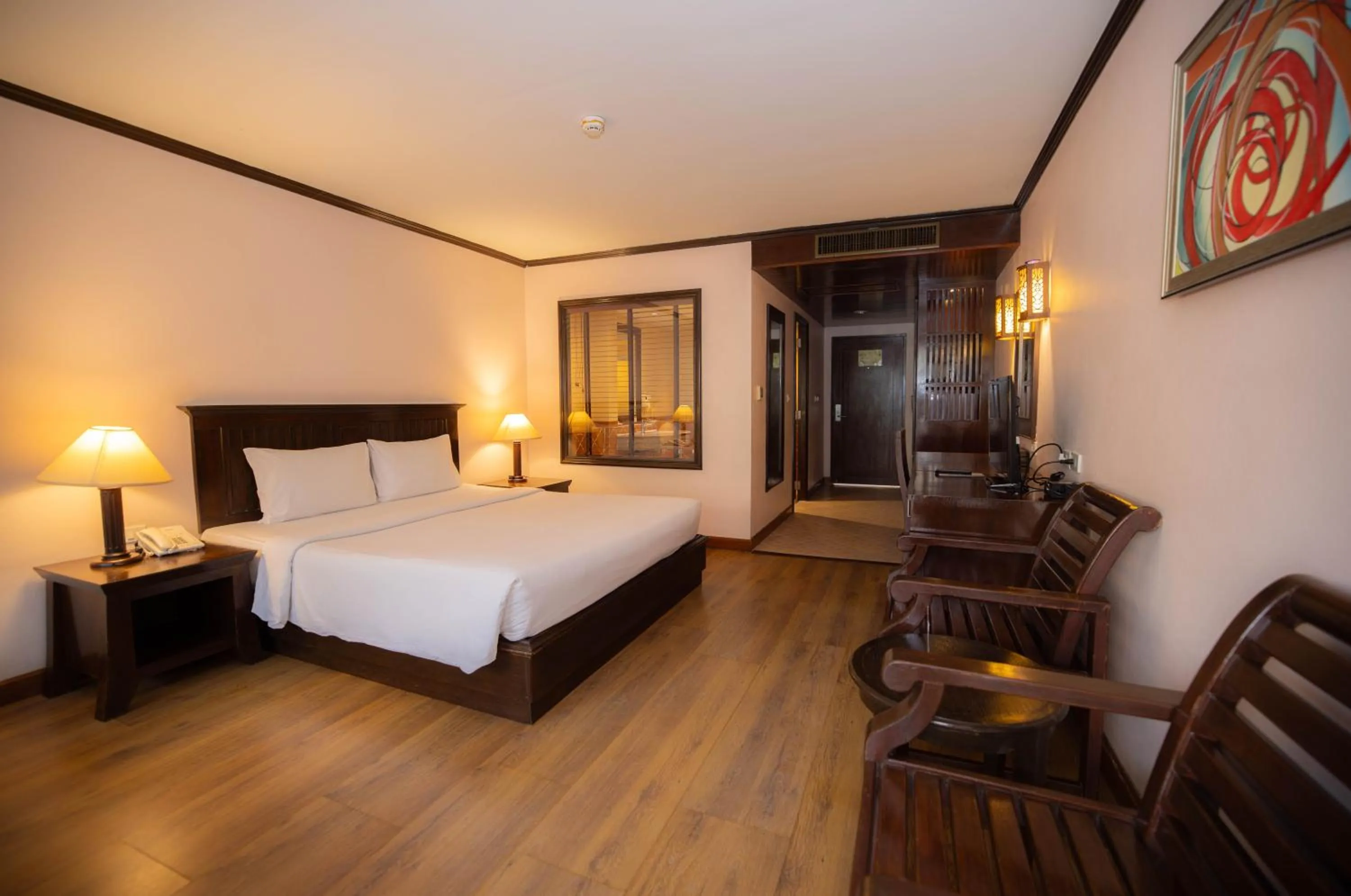 Bed in Baumanburi Hotel Patong