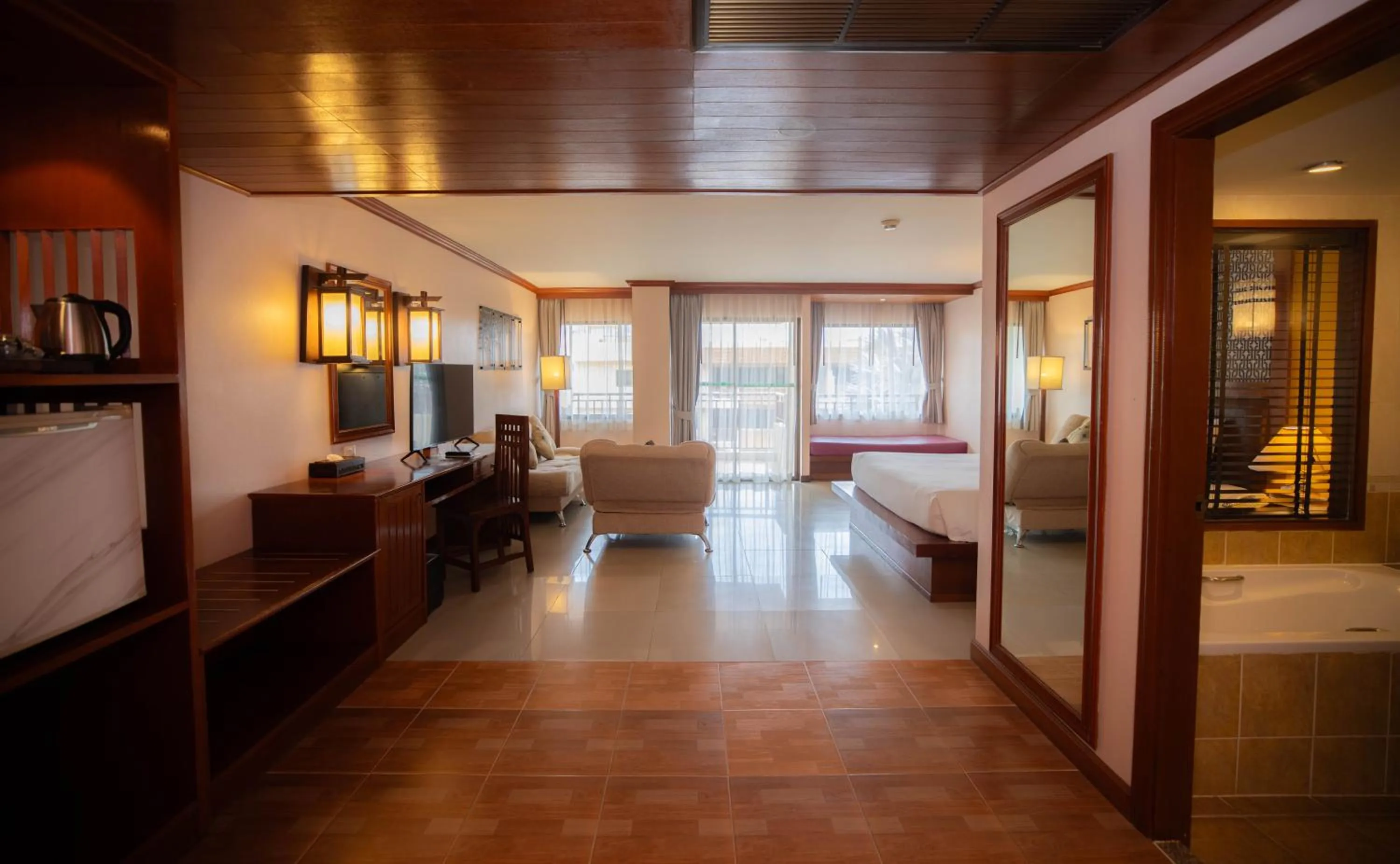 Bed in Baumanburi Hotel Patong