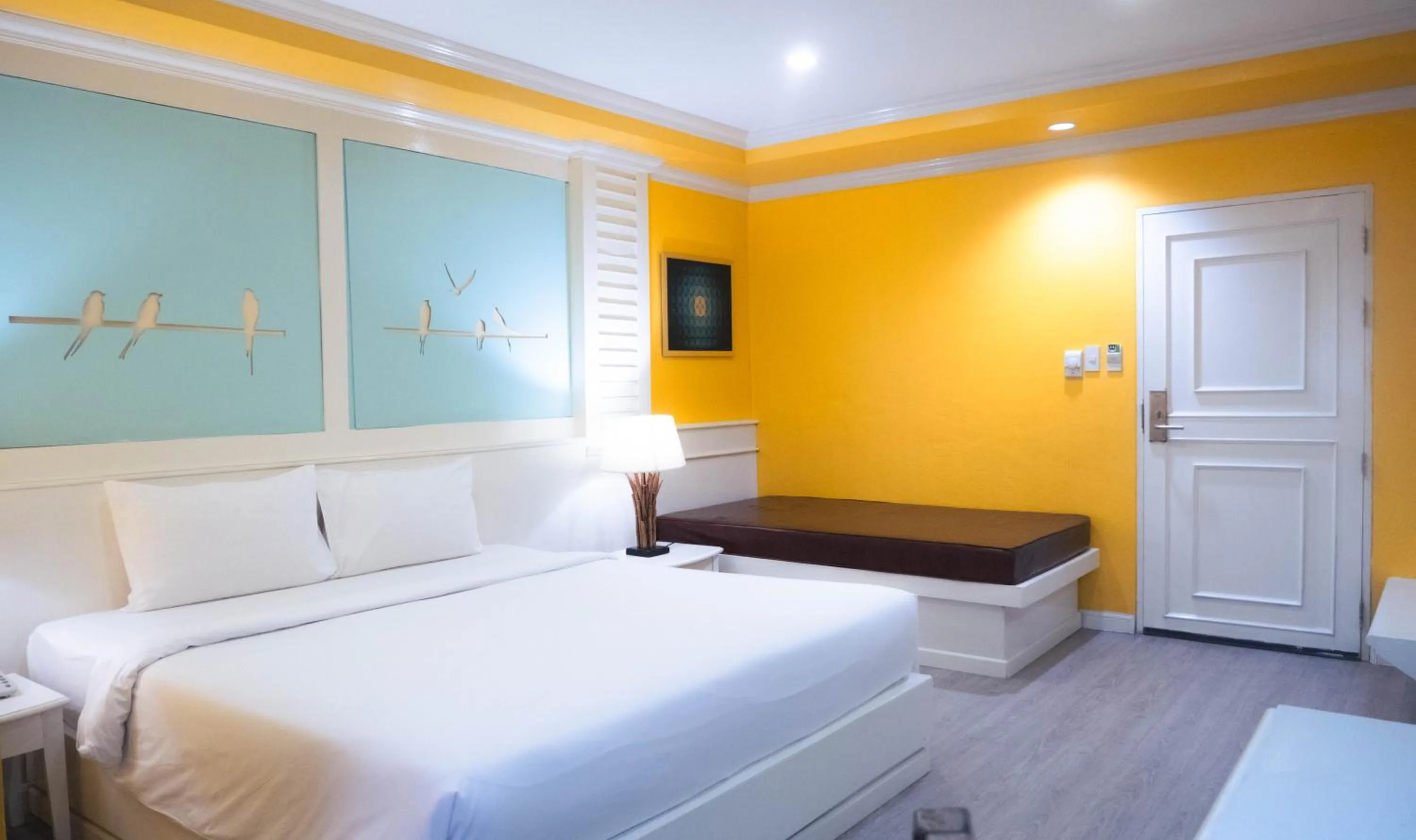 Bed in Baumanburi Hotel Patong