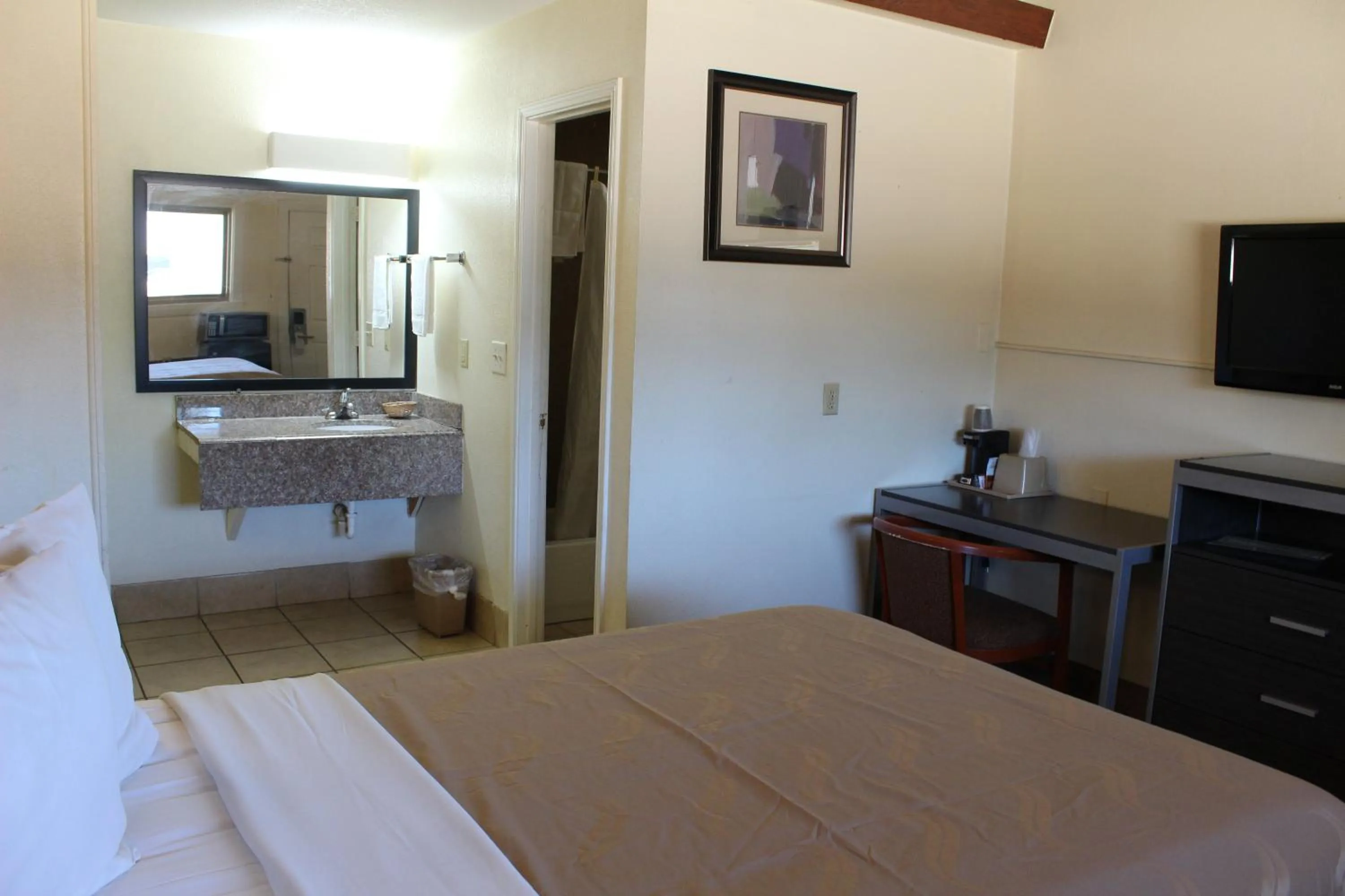 Bed in Evergreen Inn and R.V.