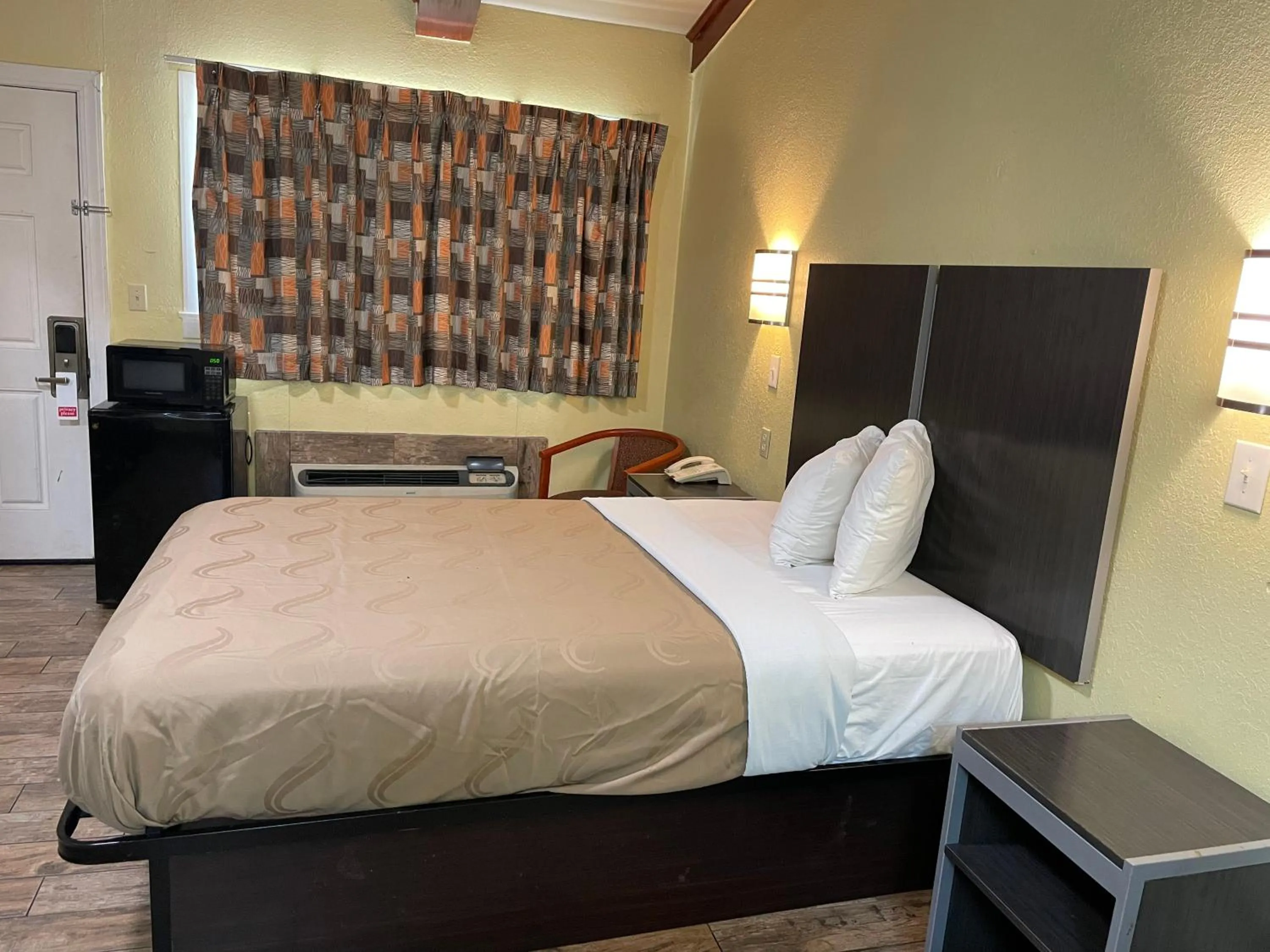 Bed in Evergreen Inn and R.V.