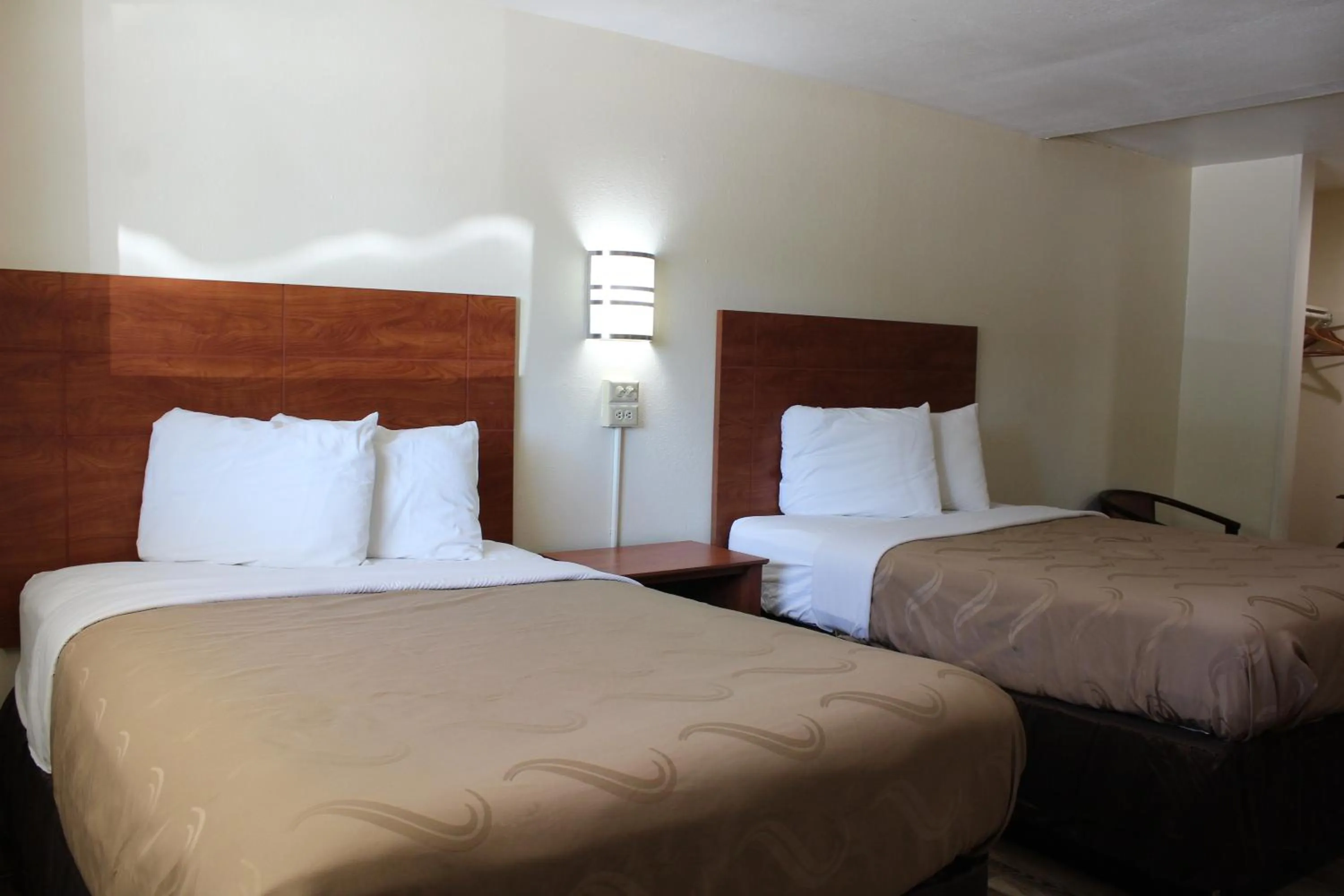 Bed in Evergreen Inn and R.V.