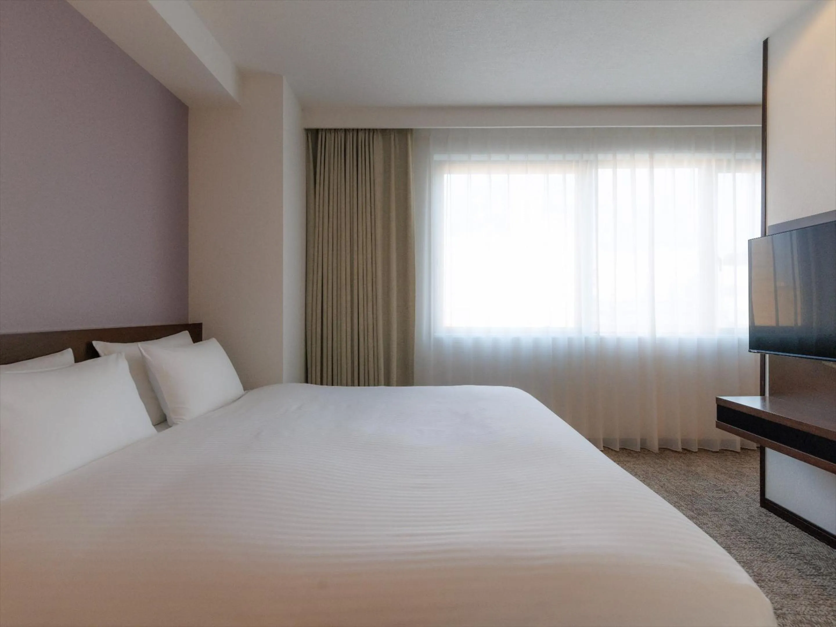 Photo of the whole room, Bed in JR Kyushu Hotel Kagoshima