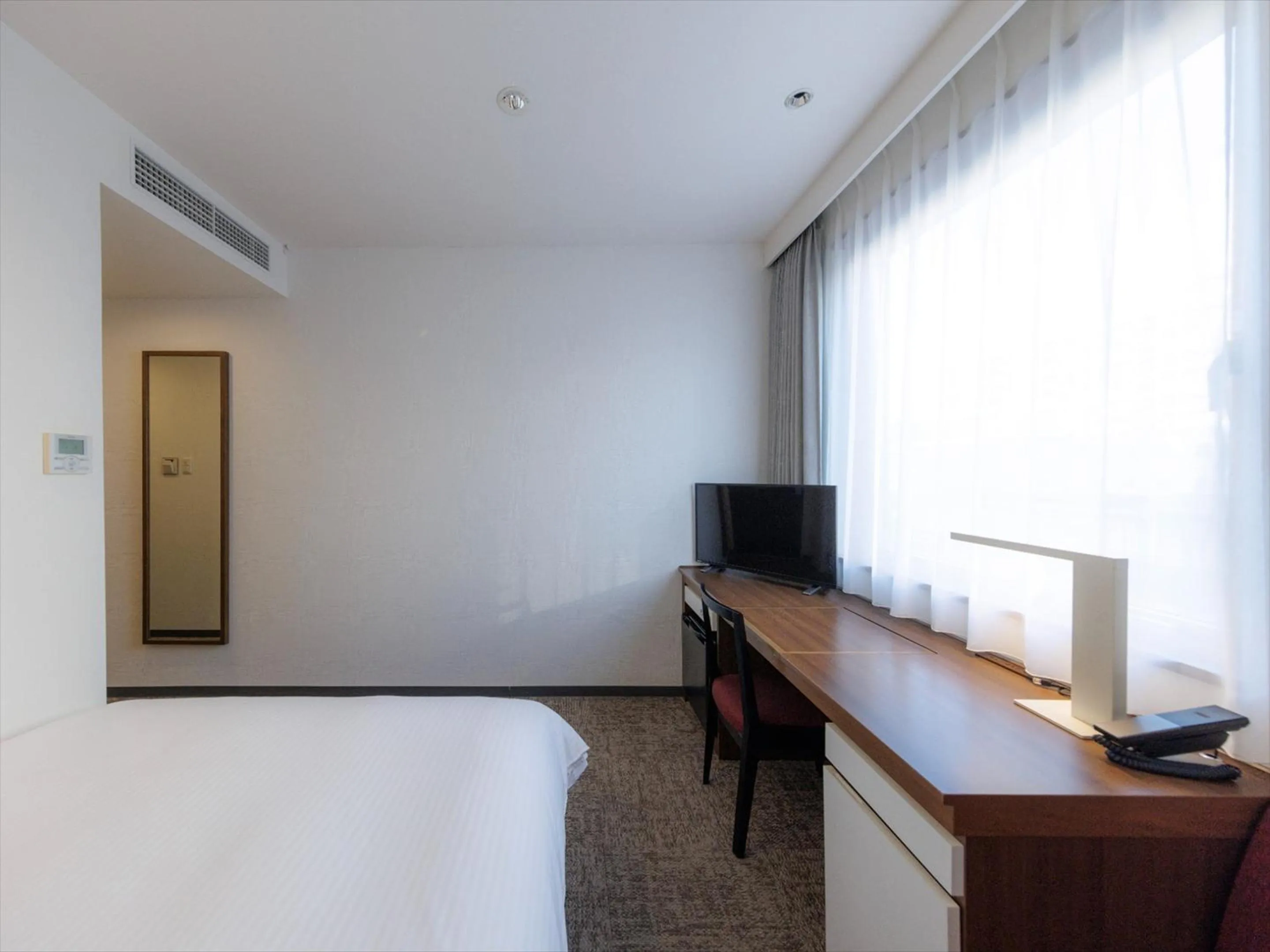 Photo of the whole room, Bed in JR Kyushu Hotel Kagoshima