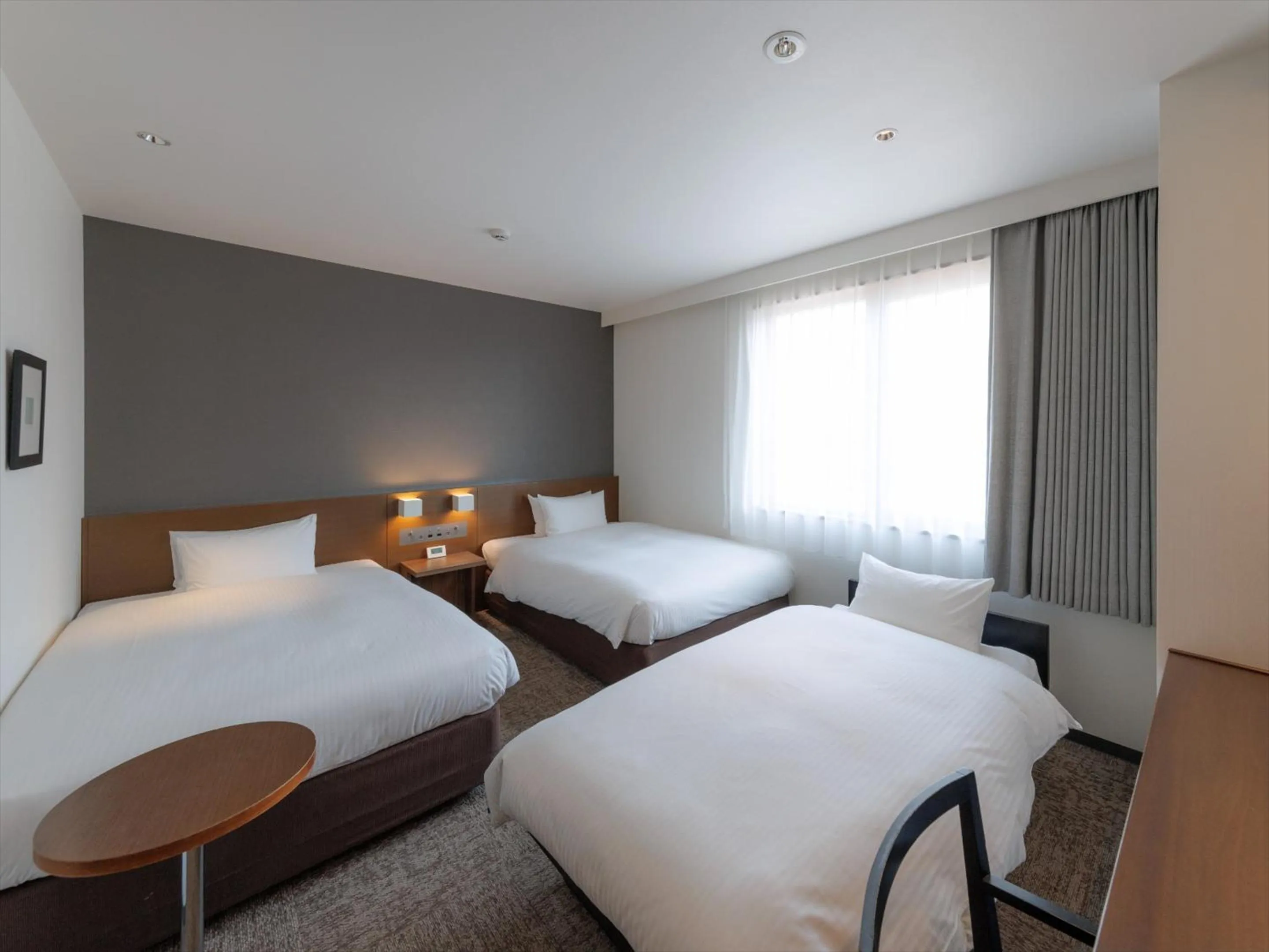 Photo of the whole room, Bed in JR Kyushu Hotel Kagoshima