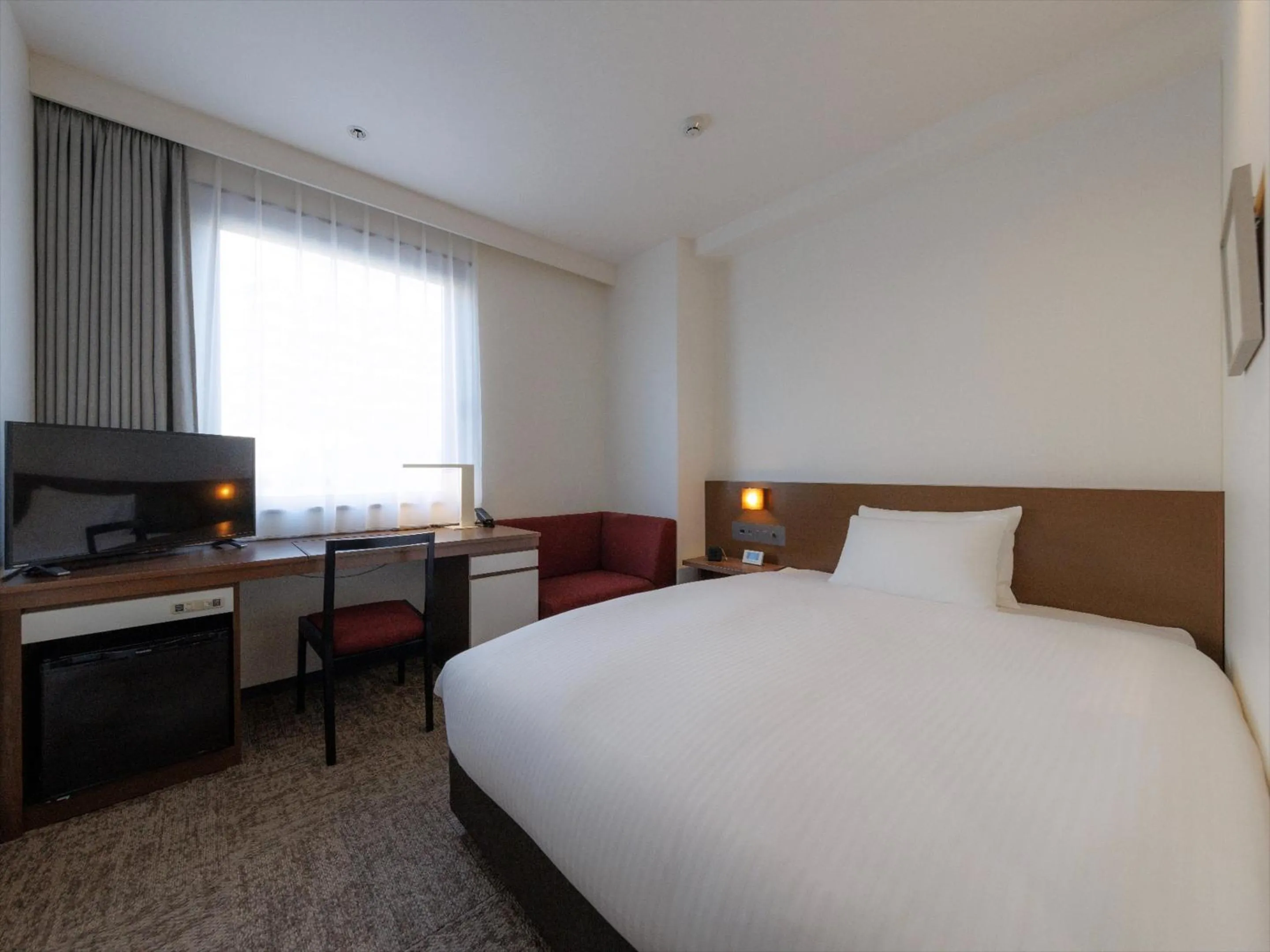 Photo of the whole room, Bed in JR Kyushu Hotel Kagoshima