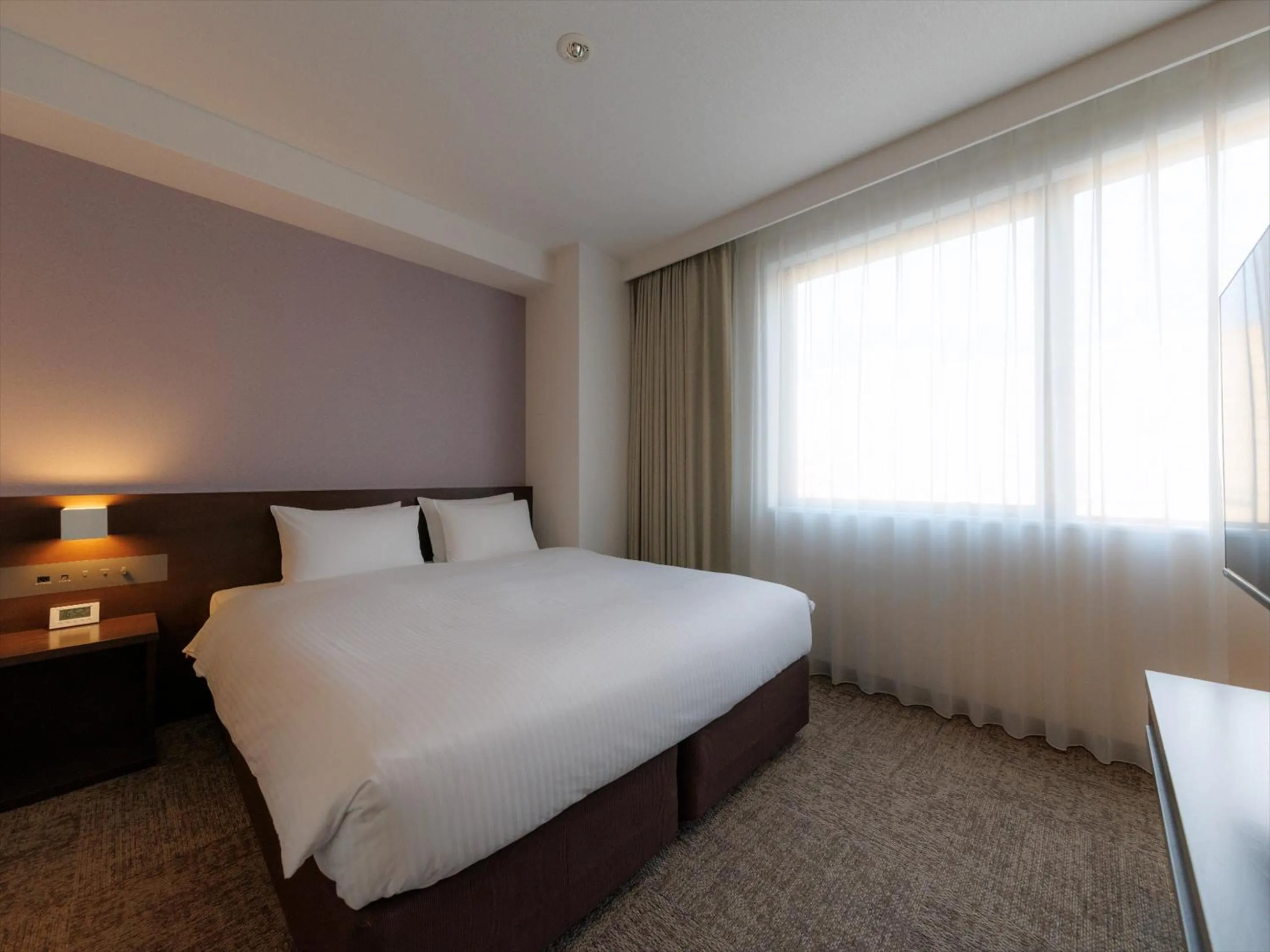 Photo of the whole room, Bed in JR Kyushu Hotel Kagoshima