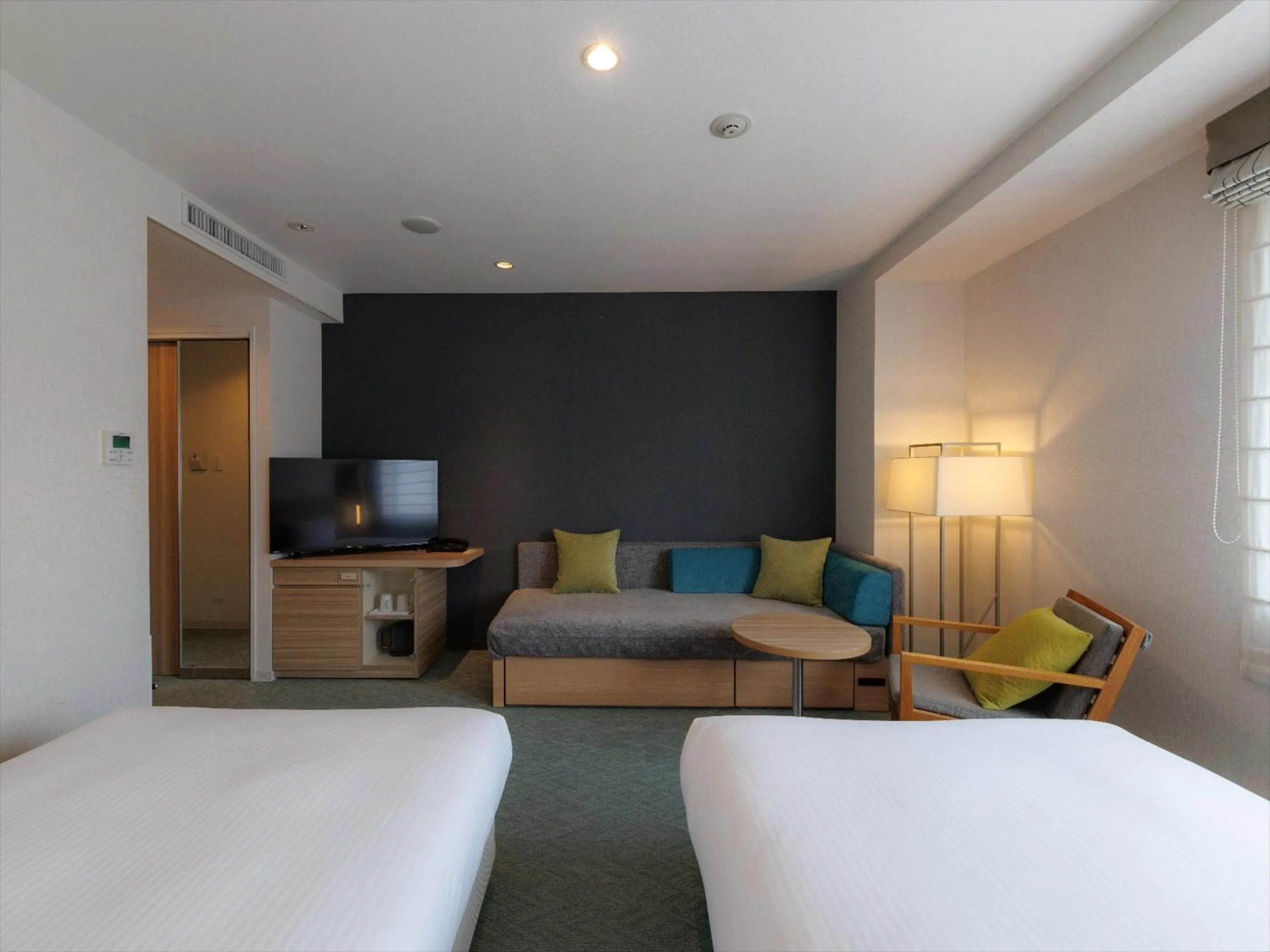 Photo of the whole room, Bed in JR Kyushu Hotel Kagoshima