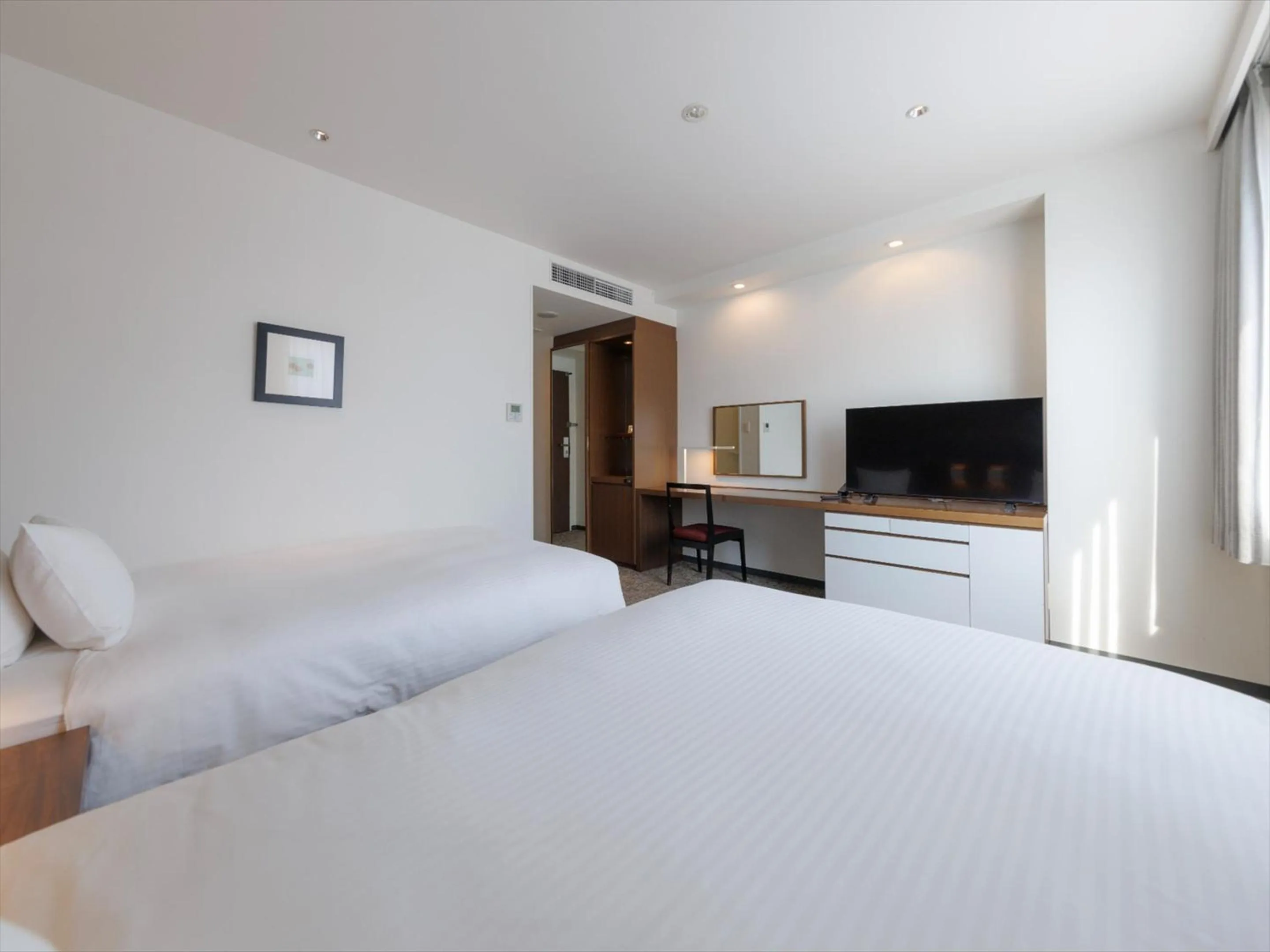 Photo of the whole room, Bed in JR Kyushu Hotel Kagoshima