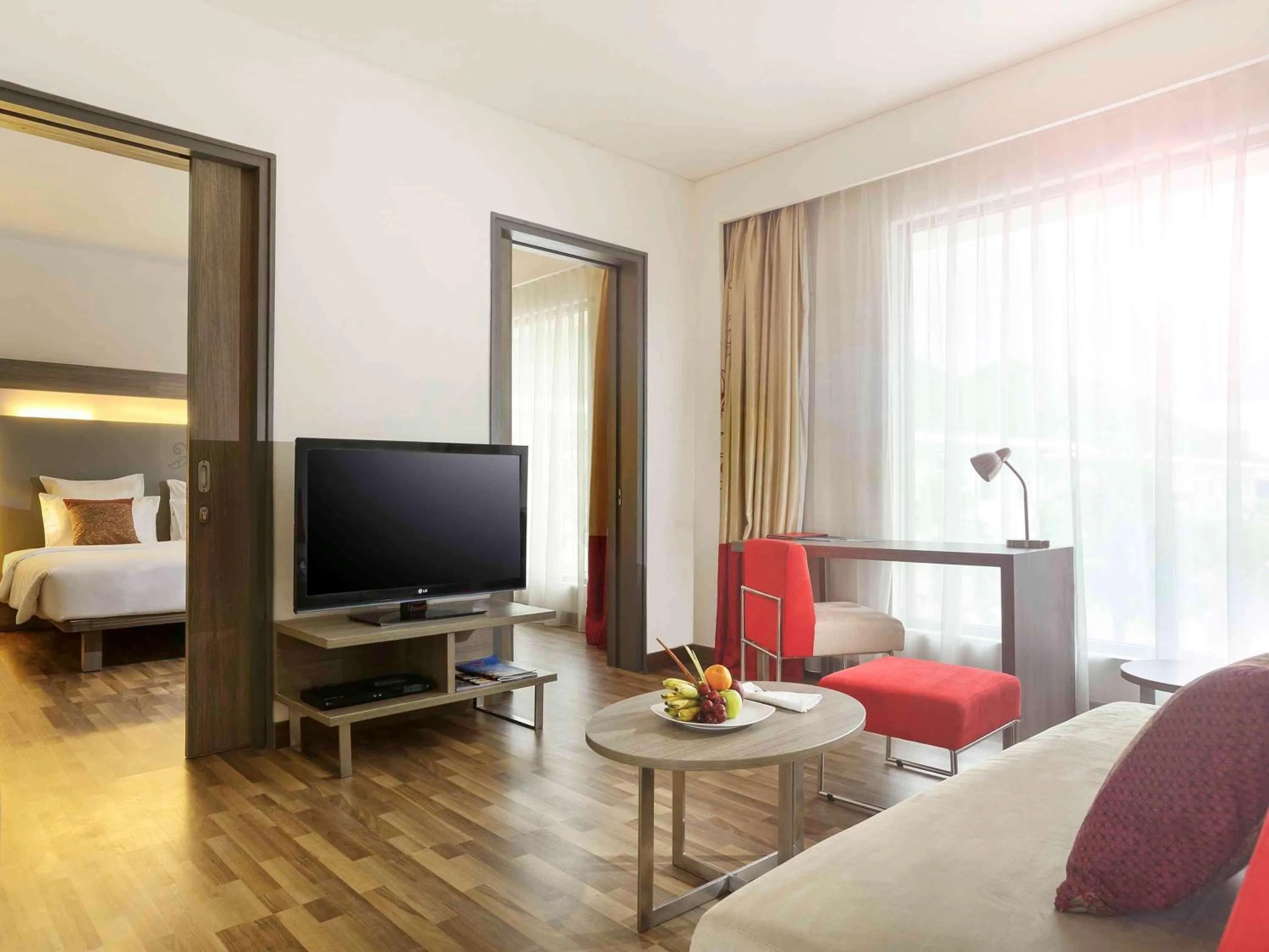 Photo of the whole room, Bed in Novotel Banjarmasin Airport