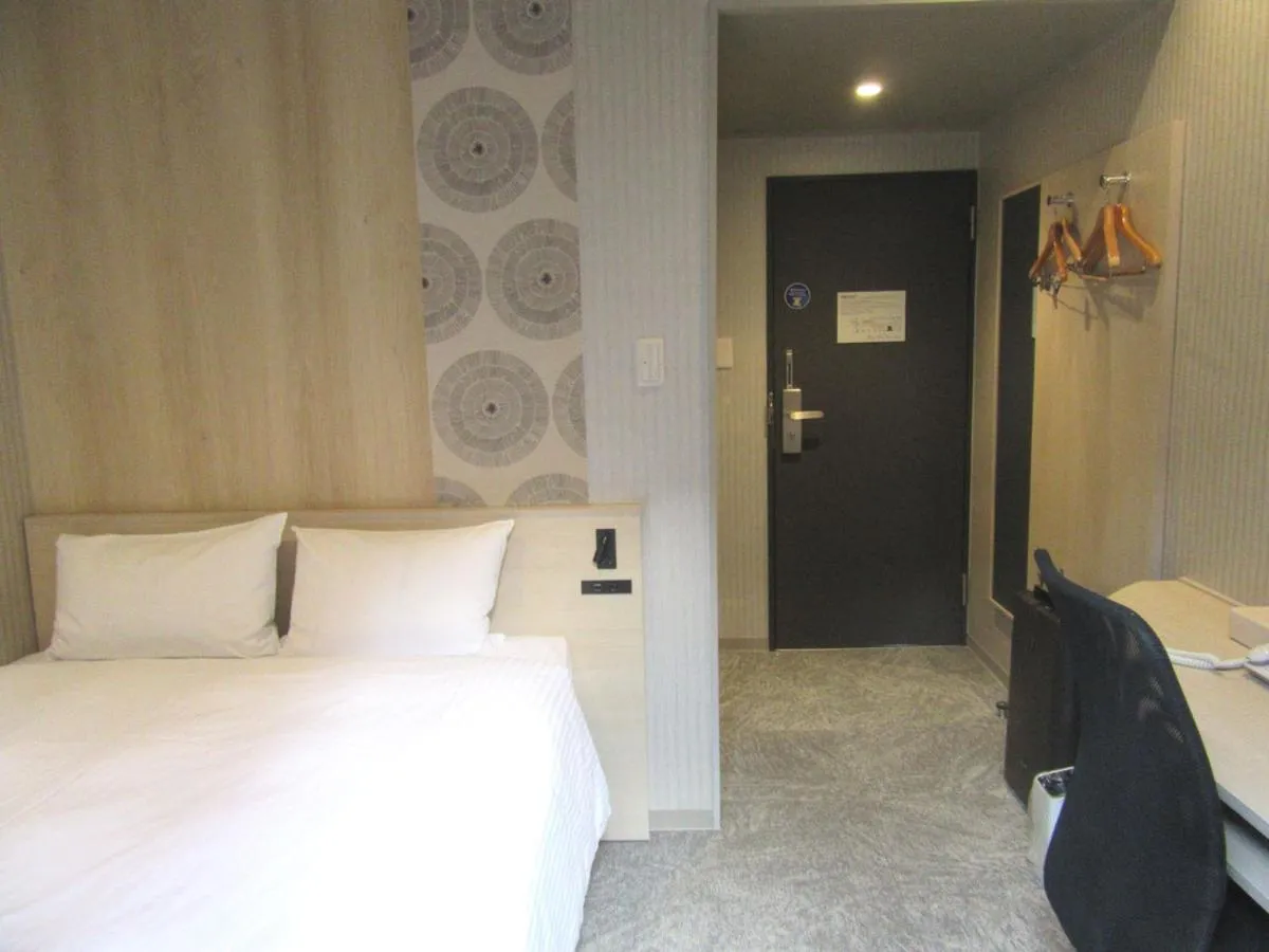 Bed in Smile Hotel Hachinohe