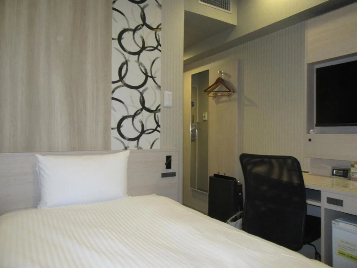 Bed in Smile Hotel Hachinohe