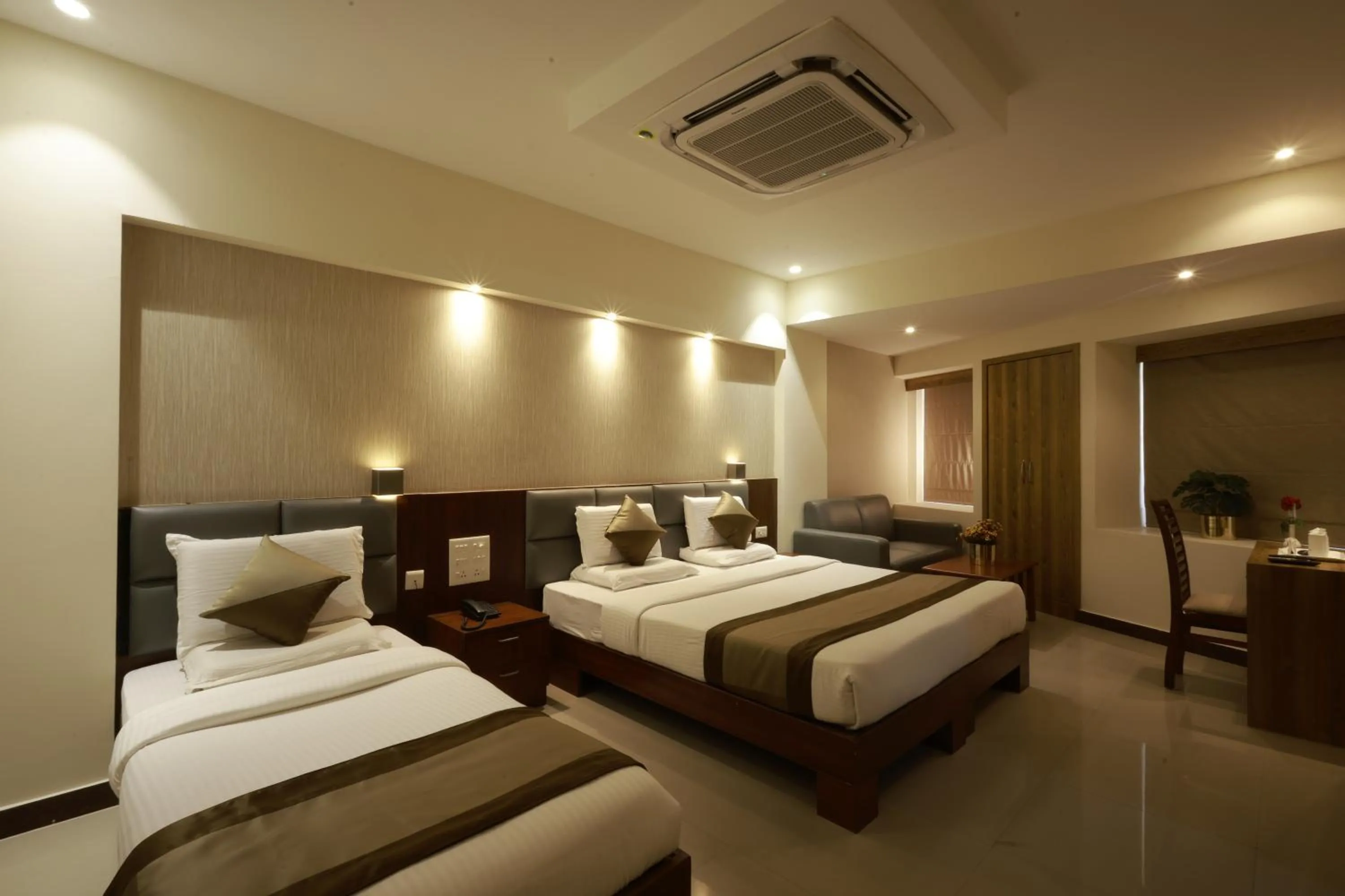 Bed in Metro Plaza Hotel by RAK Rooms, Mangaluru