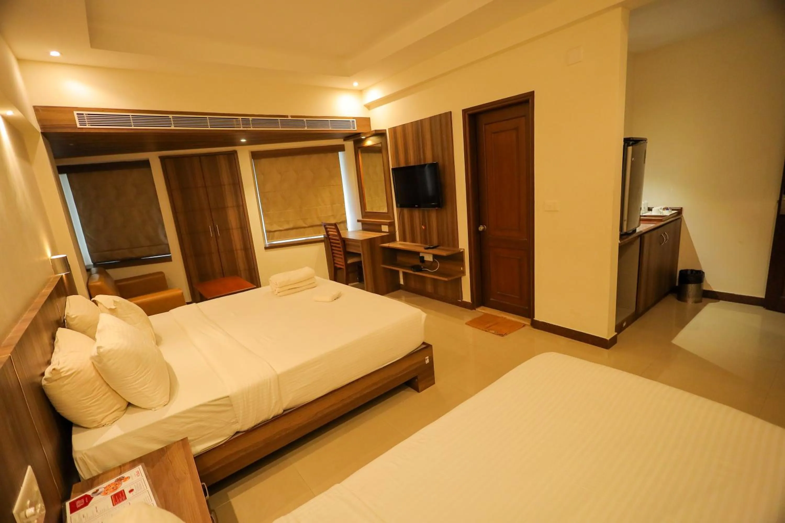 Bedroom, Bed in Metro Plaza Hotel by RAK Rooms, Mangaluru