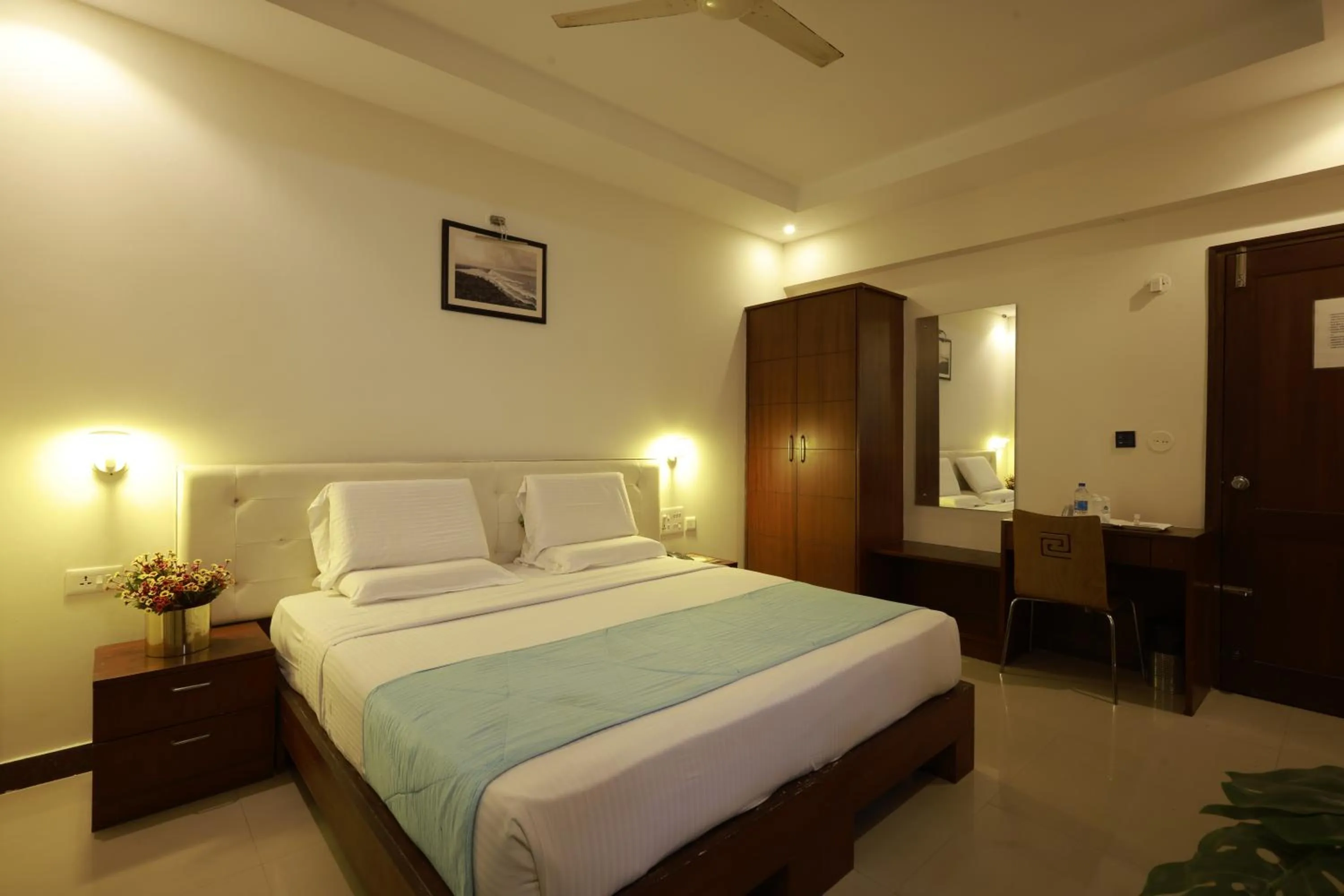 Bed in Metro Plaza Hotel by RAK Rooms, Mangaluru