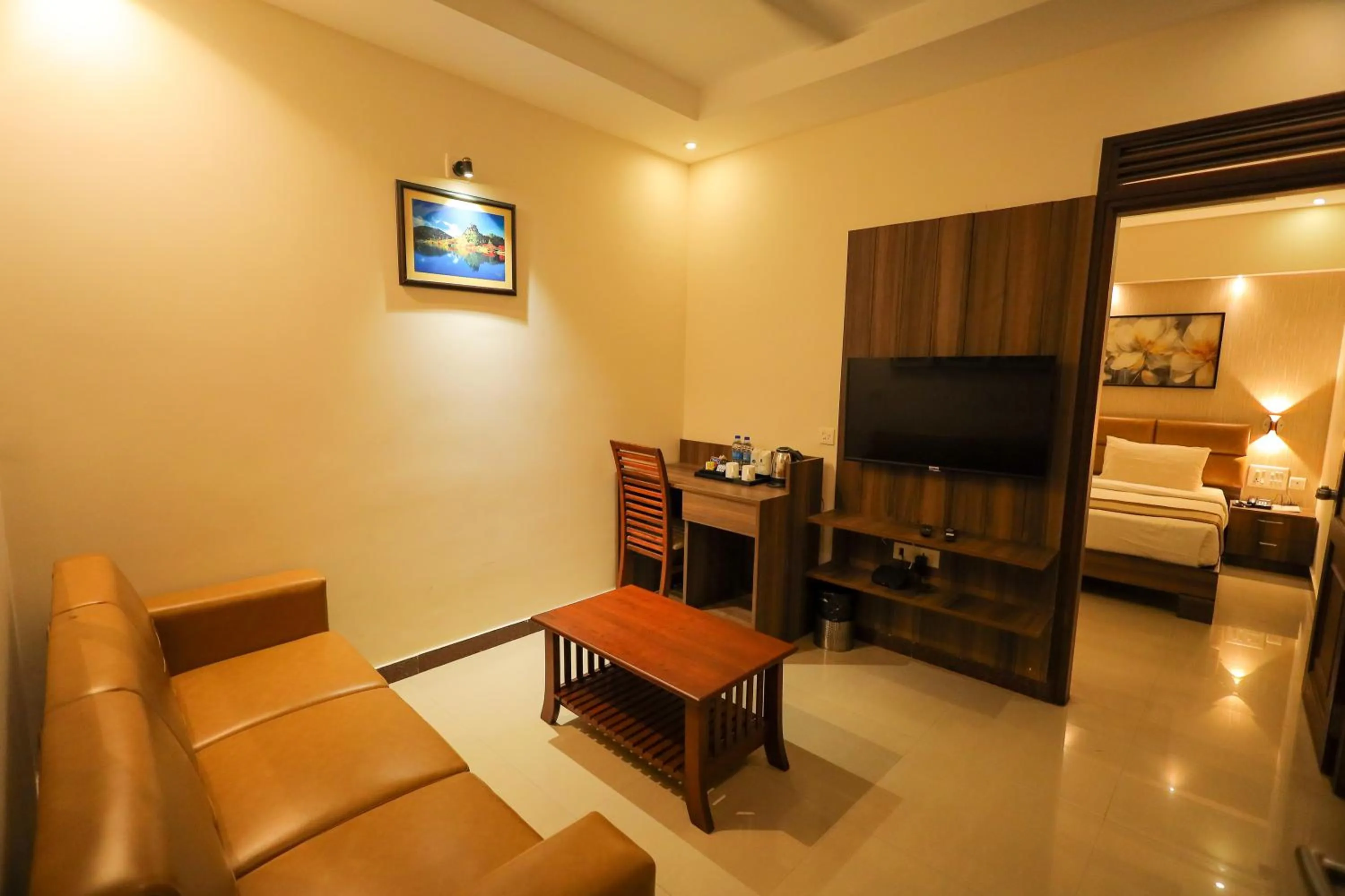 Living room, Bed in Metro Plaza Hotel by RAK Rooms, Mangaluru