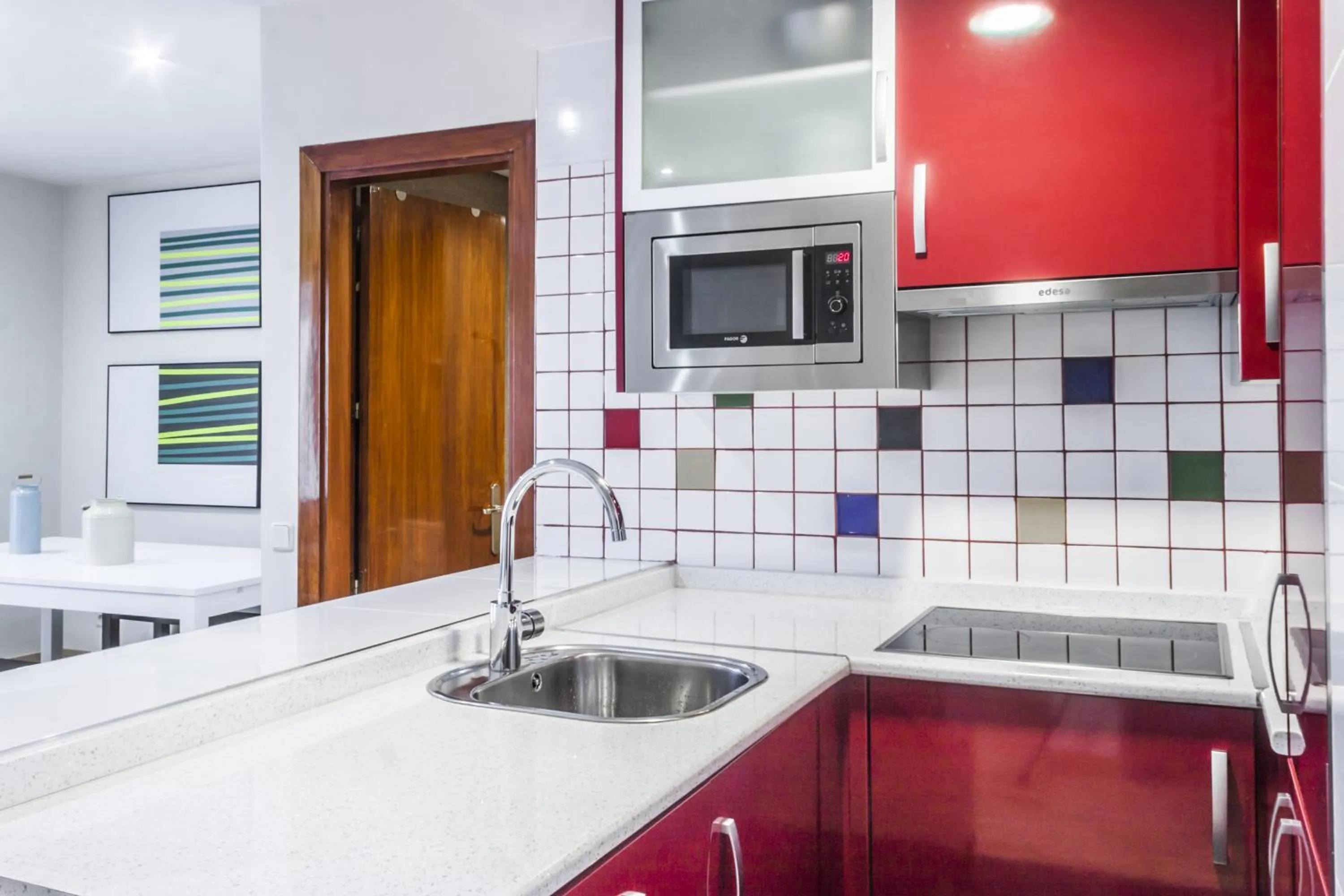Kitchen or kitchenette in Mola Suites