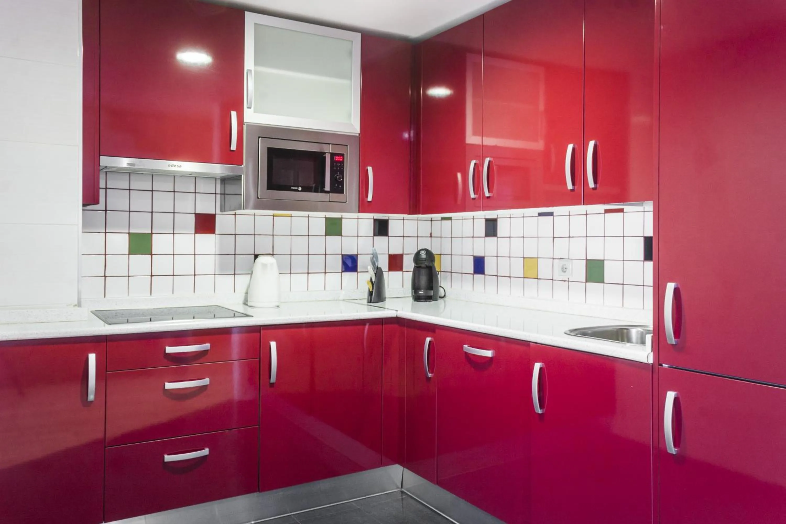 Kitchen or kitchenette in Mola Suites