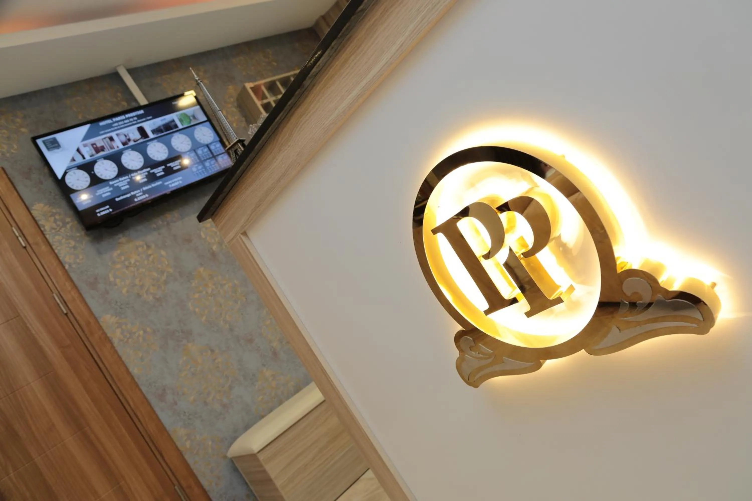 Property logo or sign in Hotel Paris Prestige