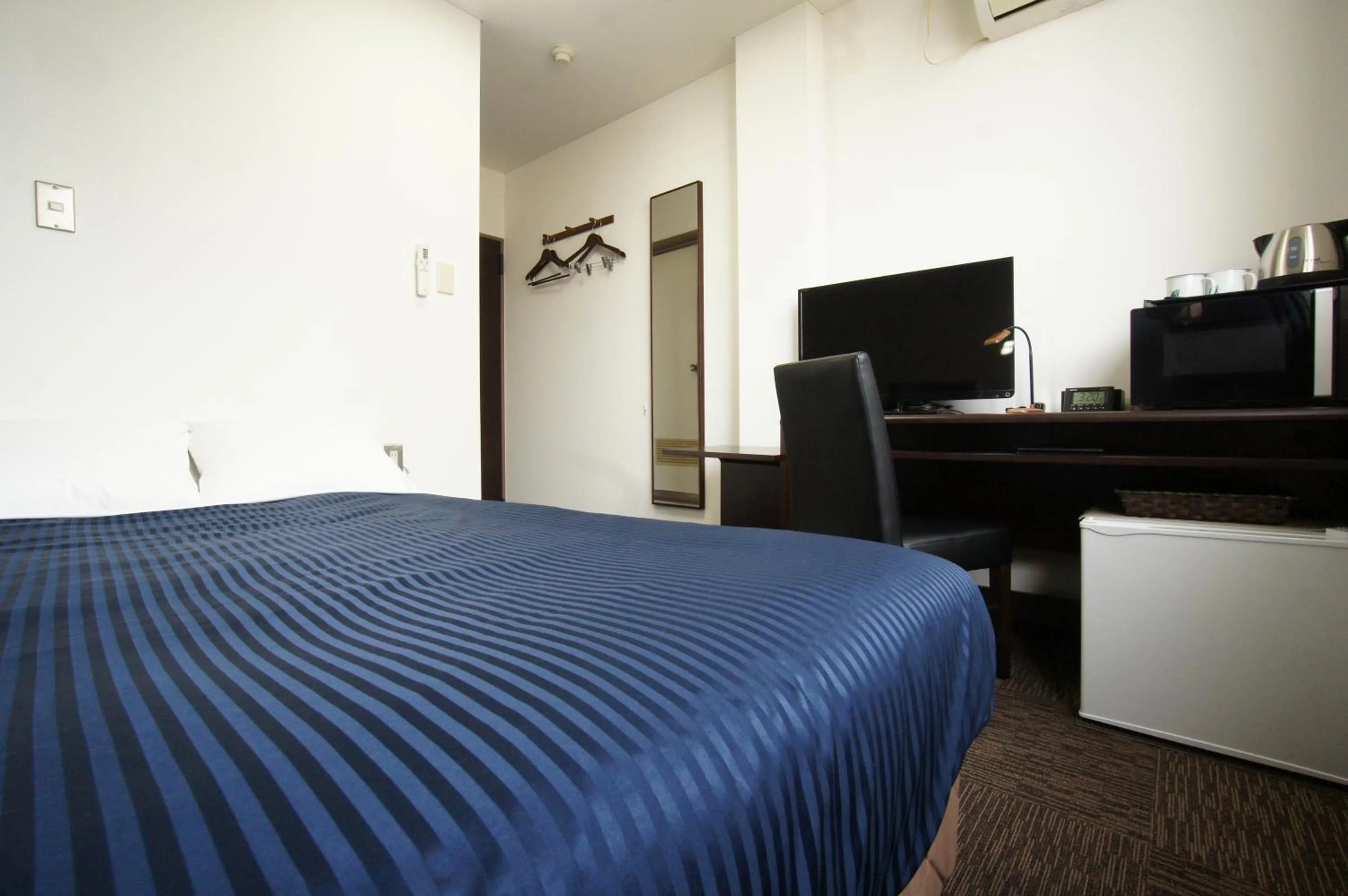 Bed in HOTEL LiVEMAX BUDGET Gunma Numata