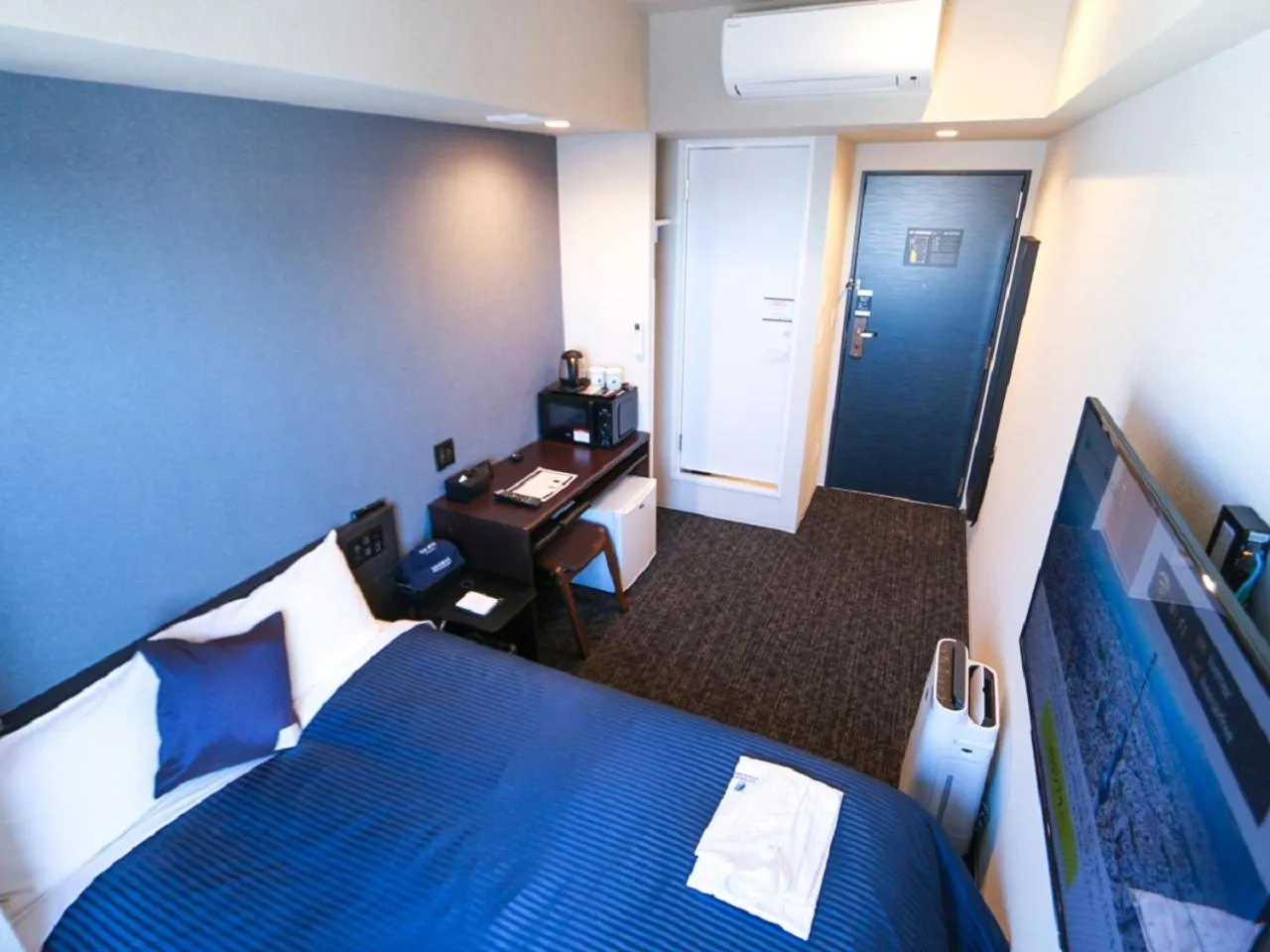 Bed in HOTEL LiVEMAX Akasaka