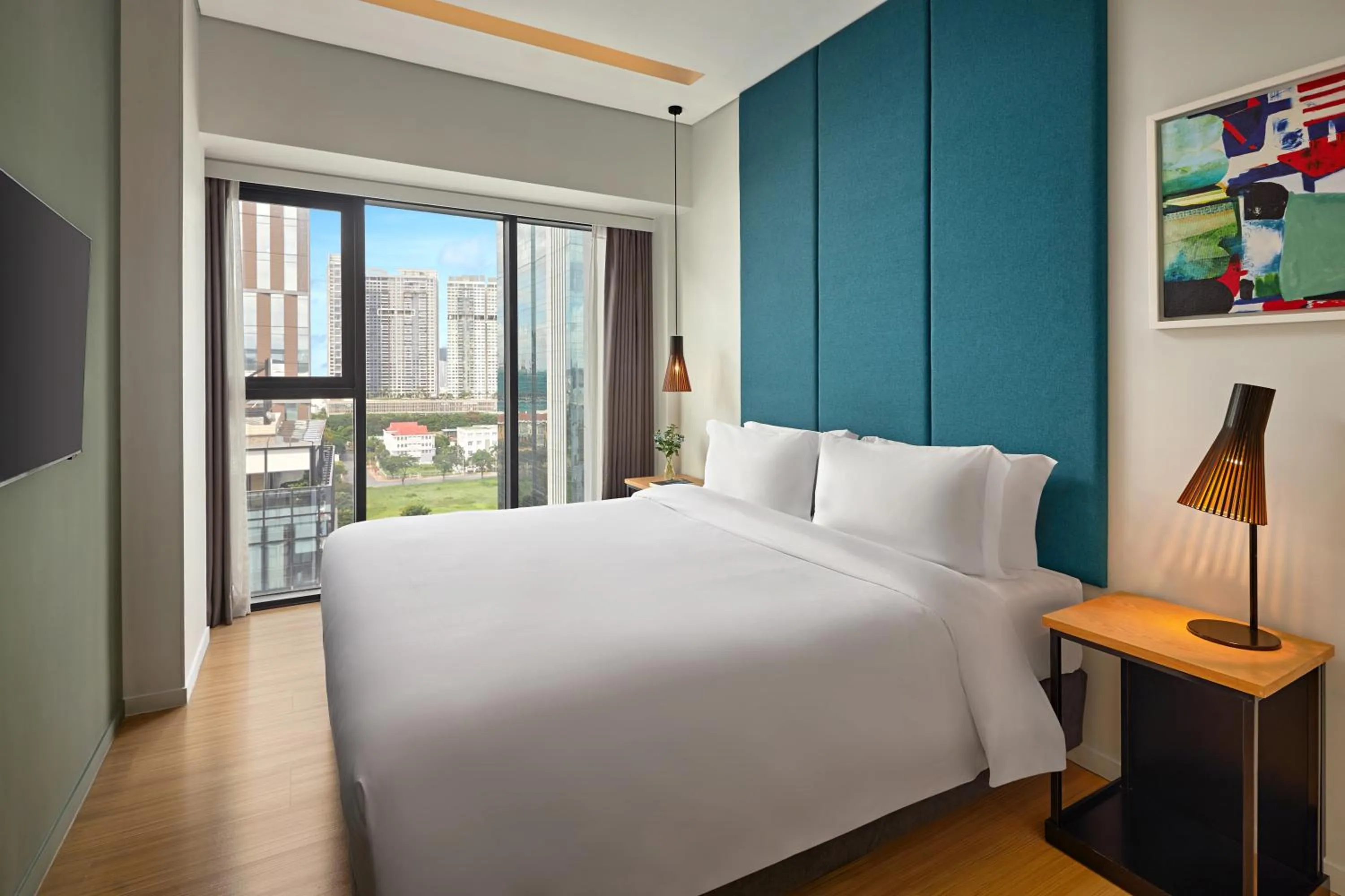 Bedroom, Bed in Novotel Living Saigon South