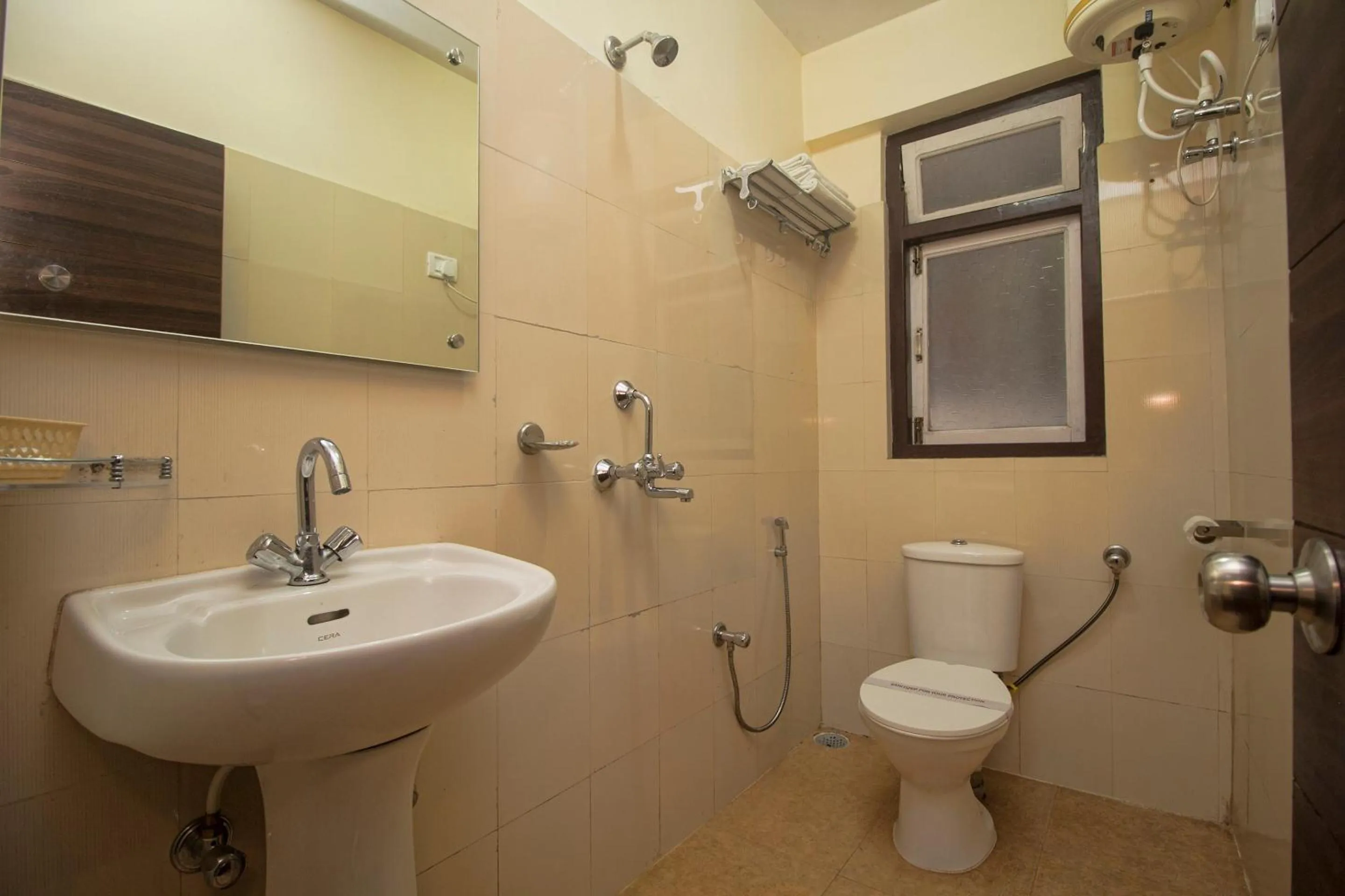 Bathroom in Super Hotel O Kshounish Residency