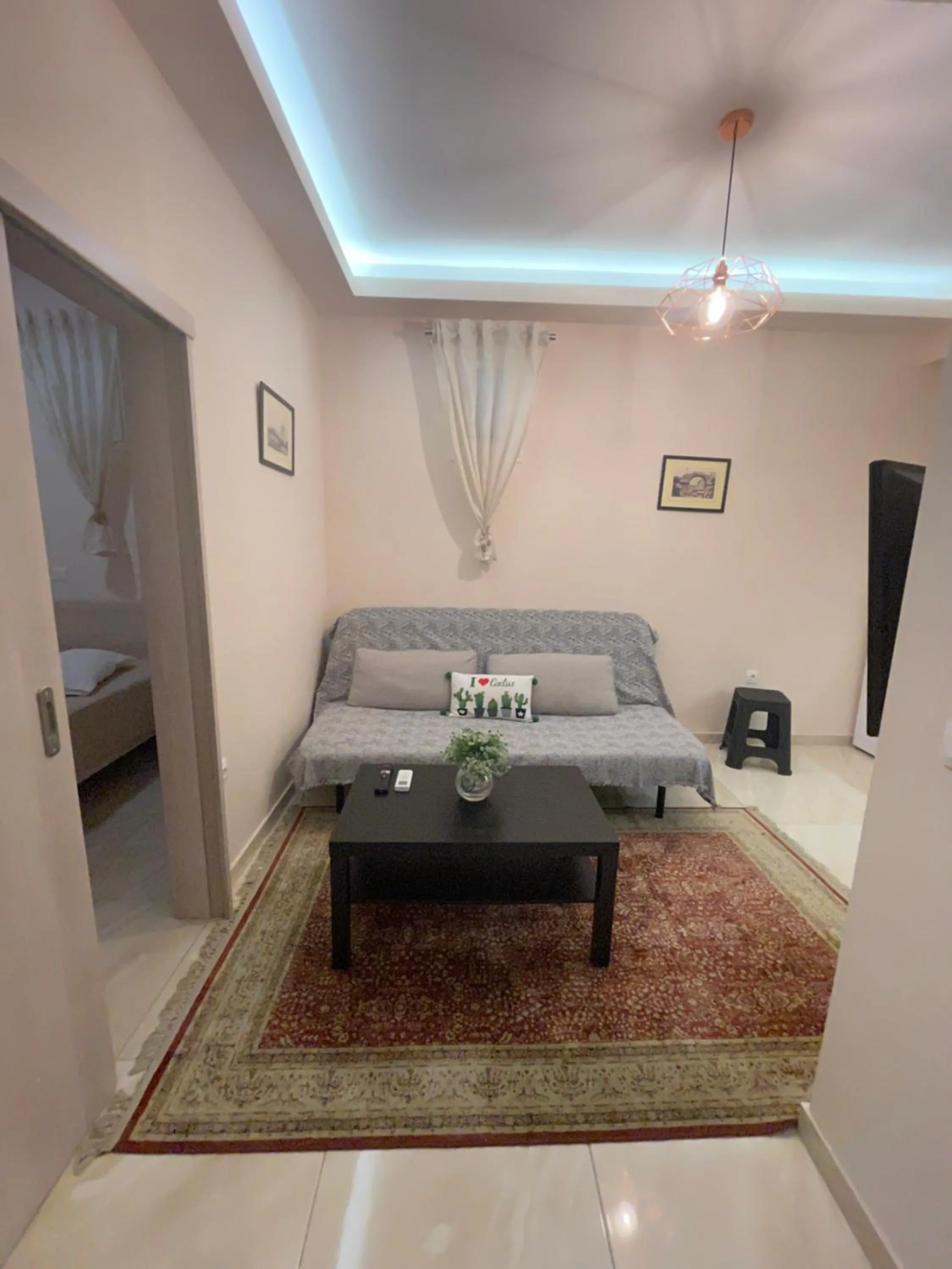 Seating area, Bed in G&M Luxury Studios