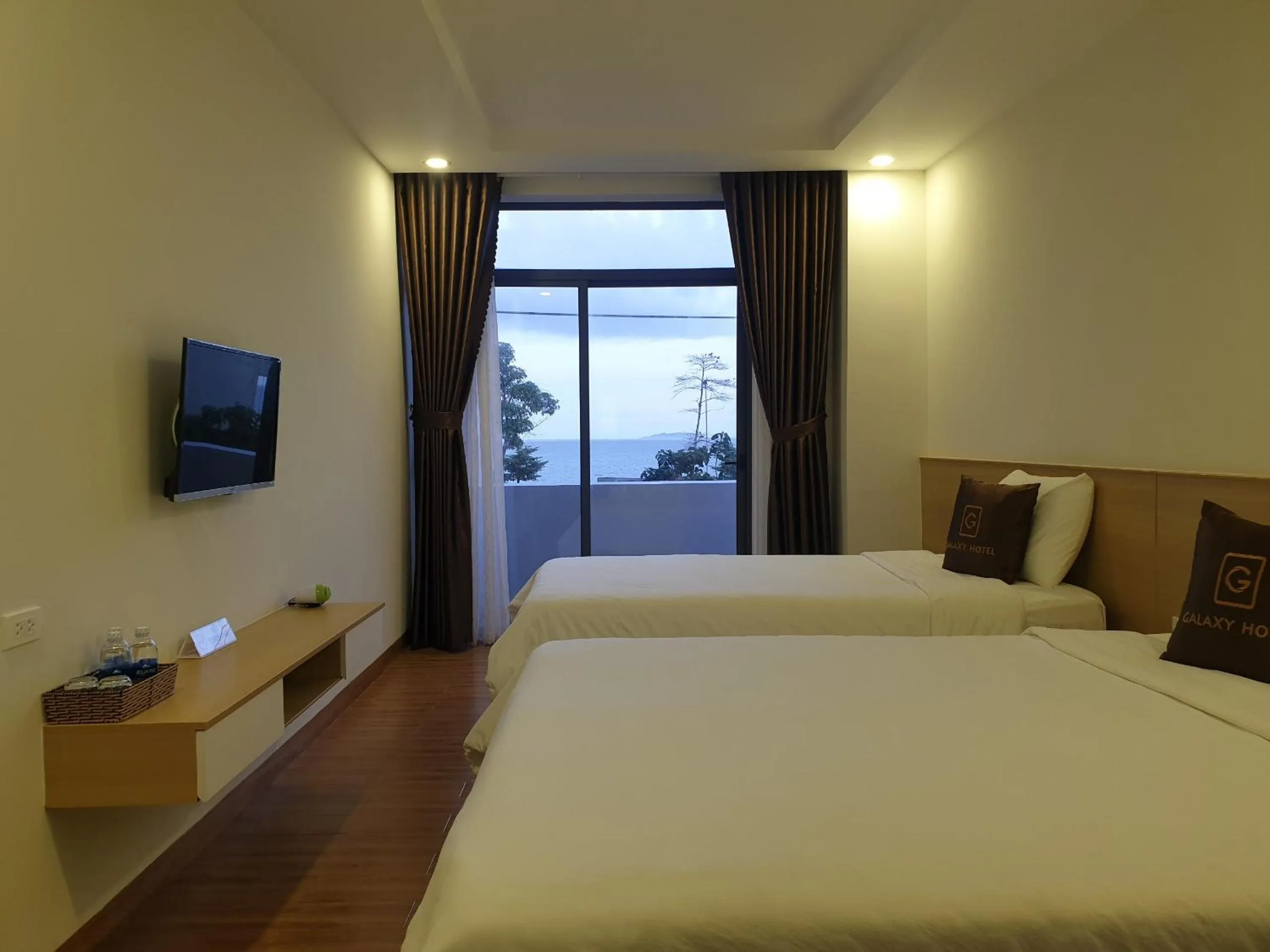 Photo of the whole room, Bed in Galaxy Hotel