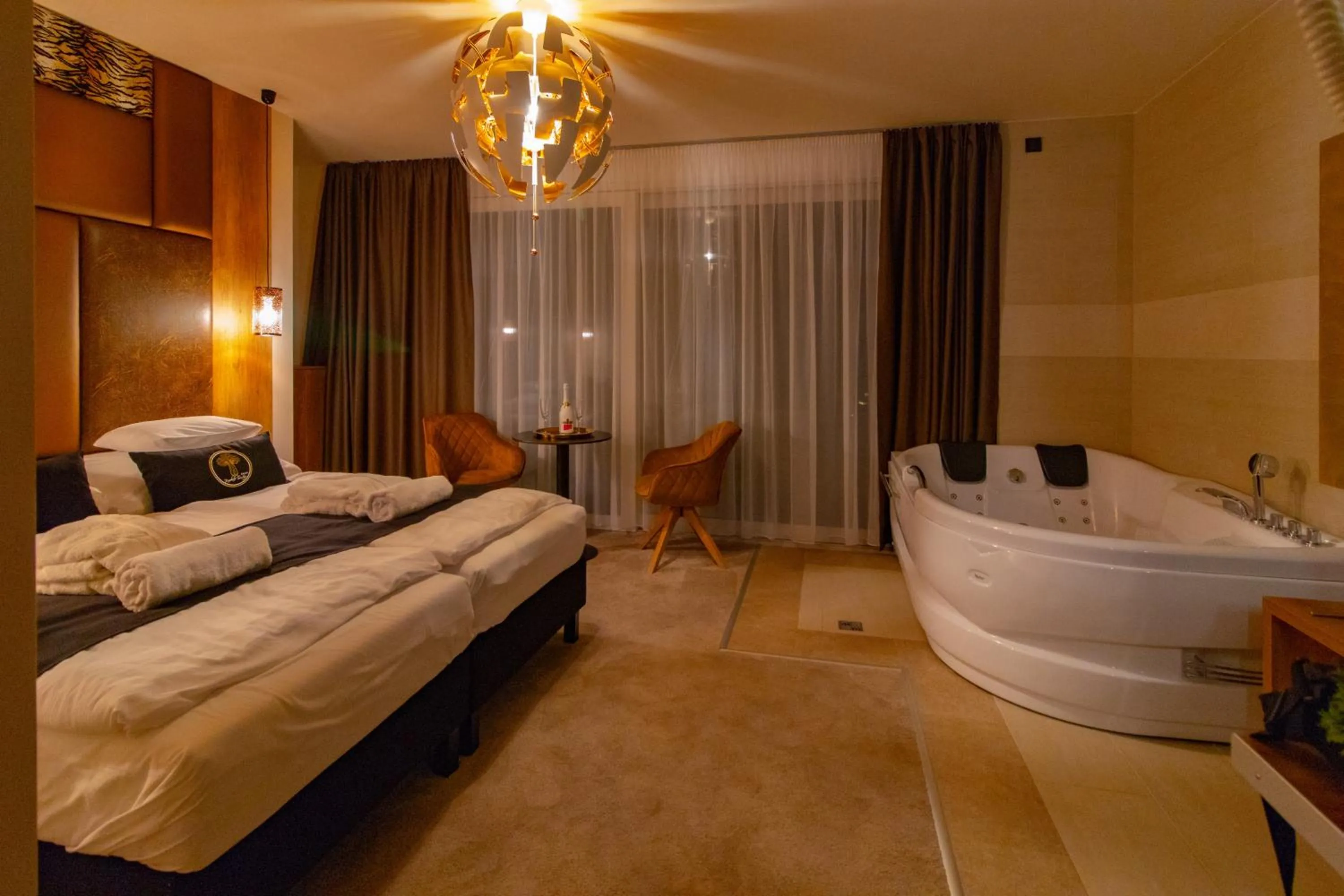 Photo of the whole room, Bed in Baobab Suites