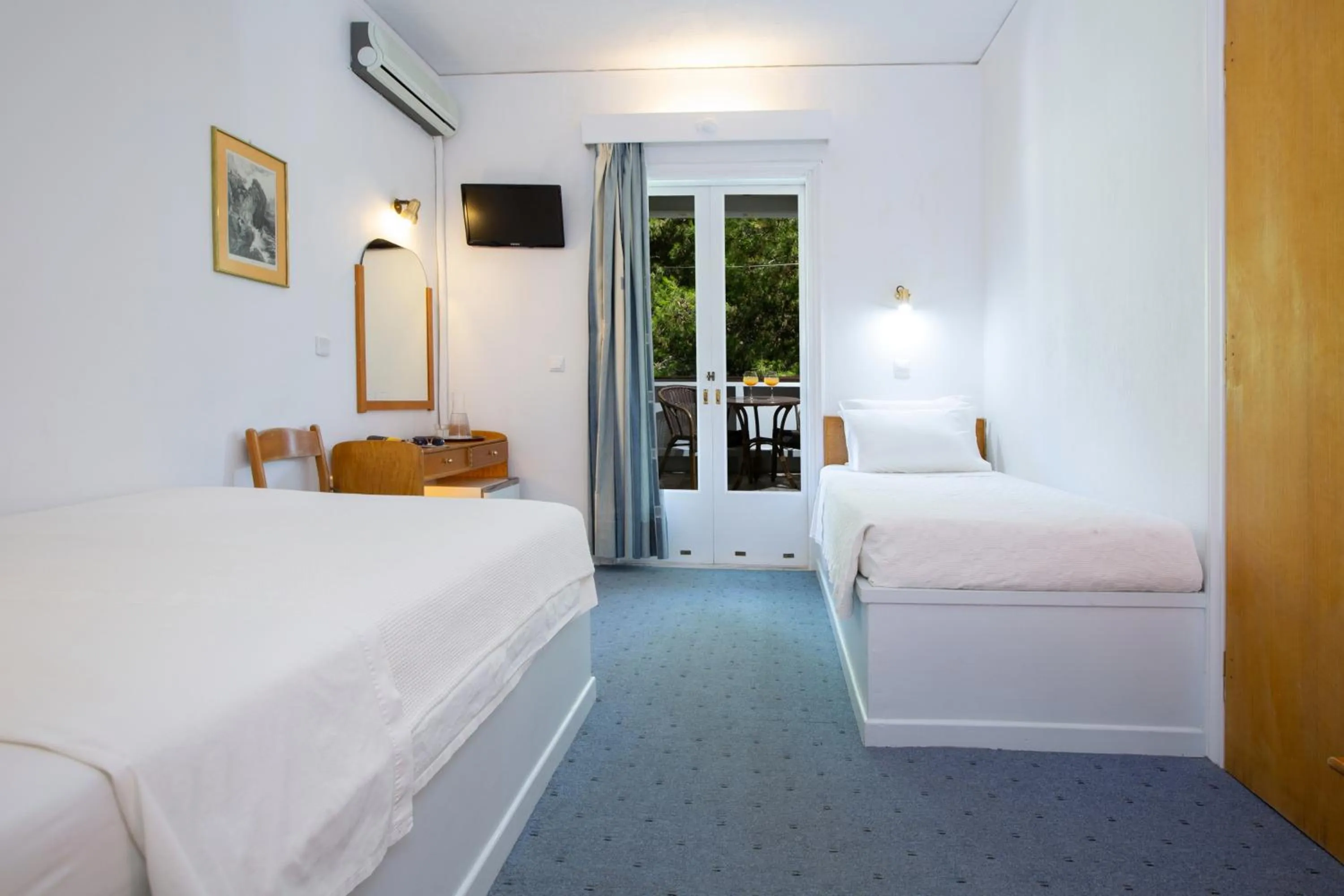 Bed in Odyssey Hotel