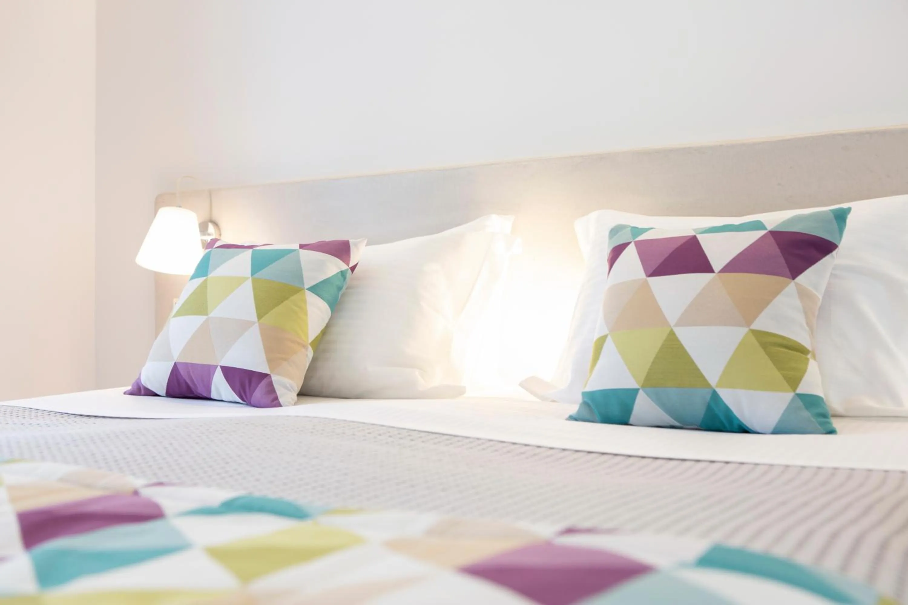 Bedroom in Odyssey Hotel