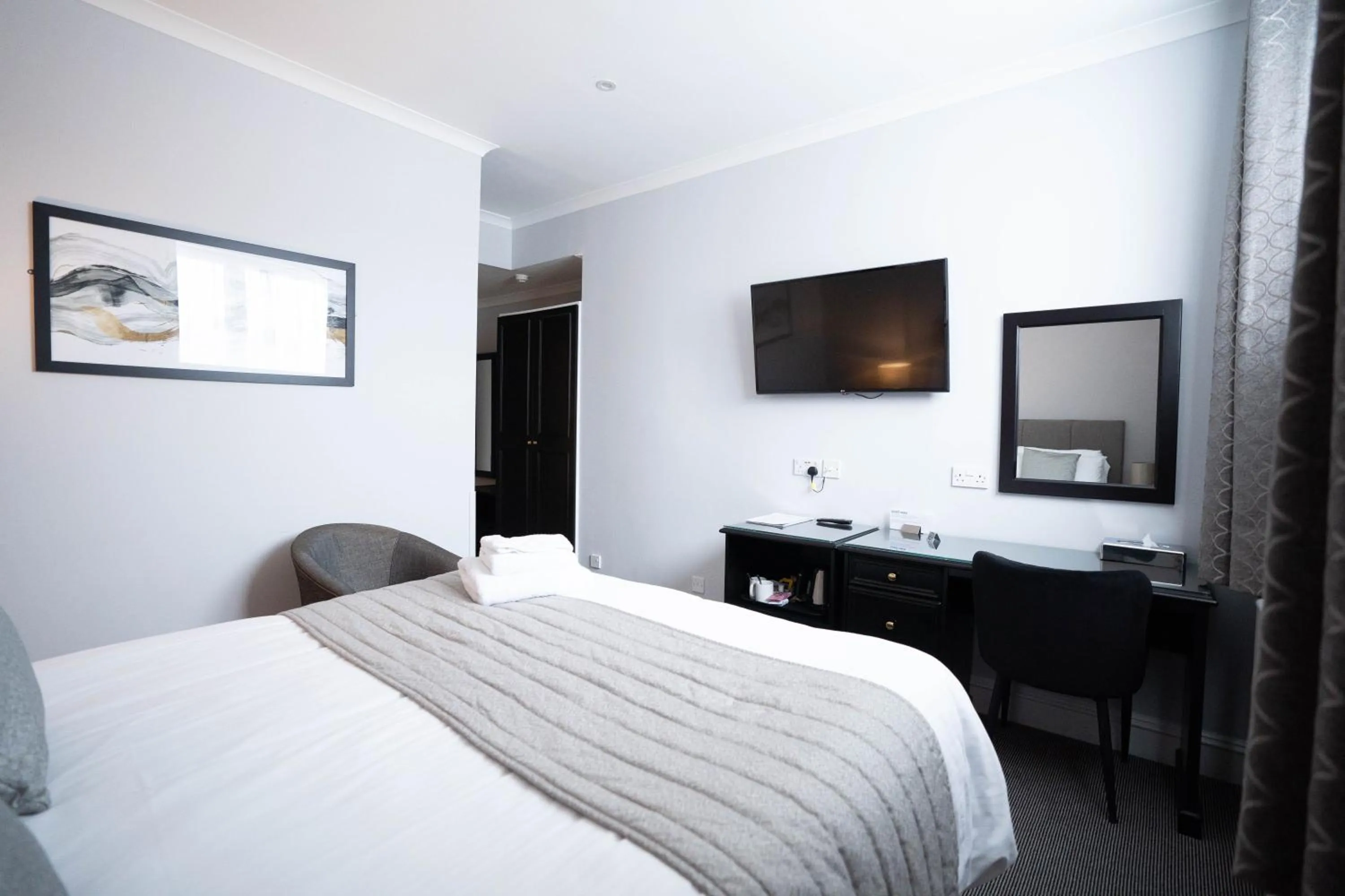 Bed in New Inn Hotel