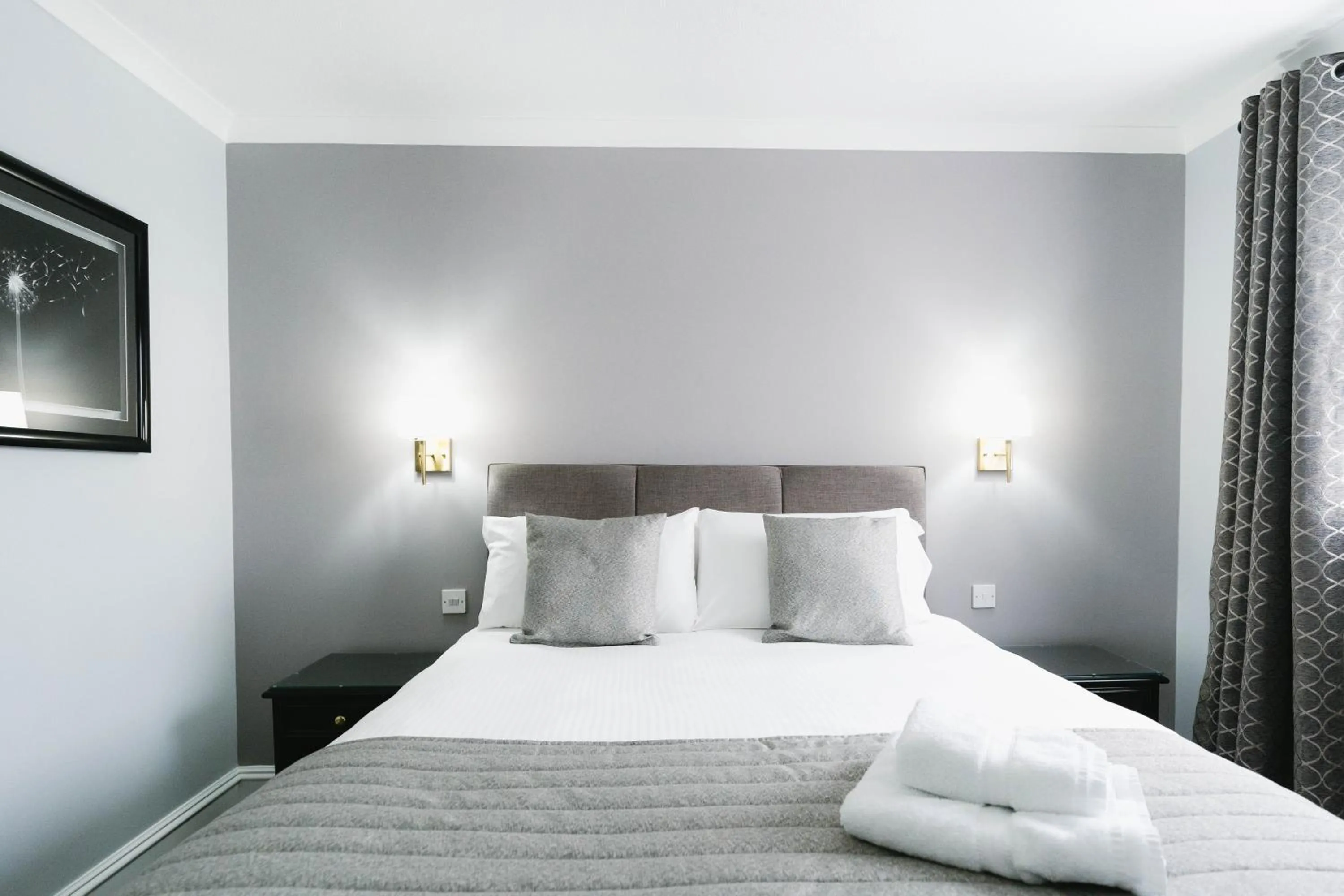 Bed in New Inn Hotel