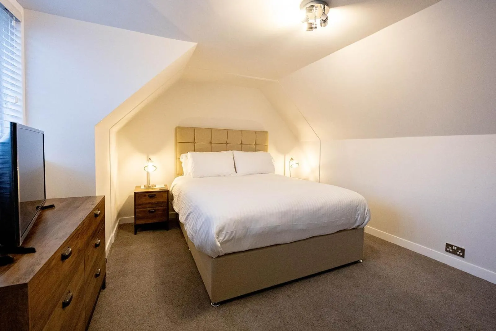 Bed in New Inn Hotel