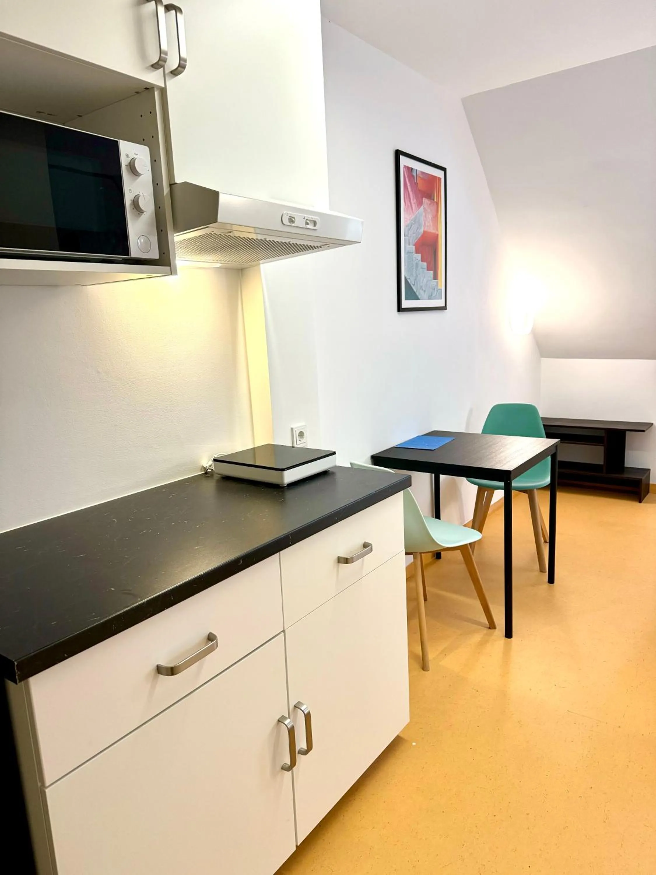 Kitchen or kitchenette in A&T Hotel & Hostel