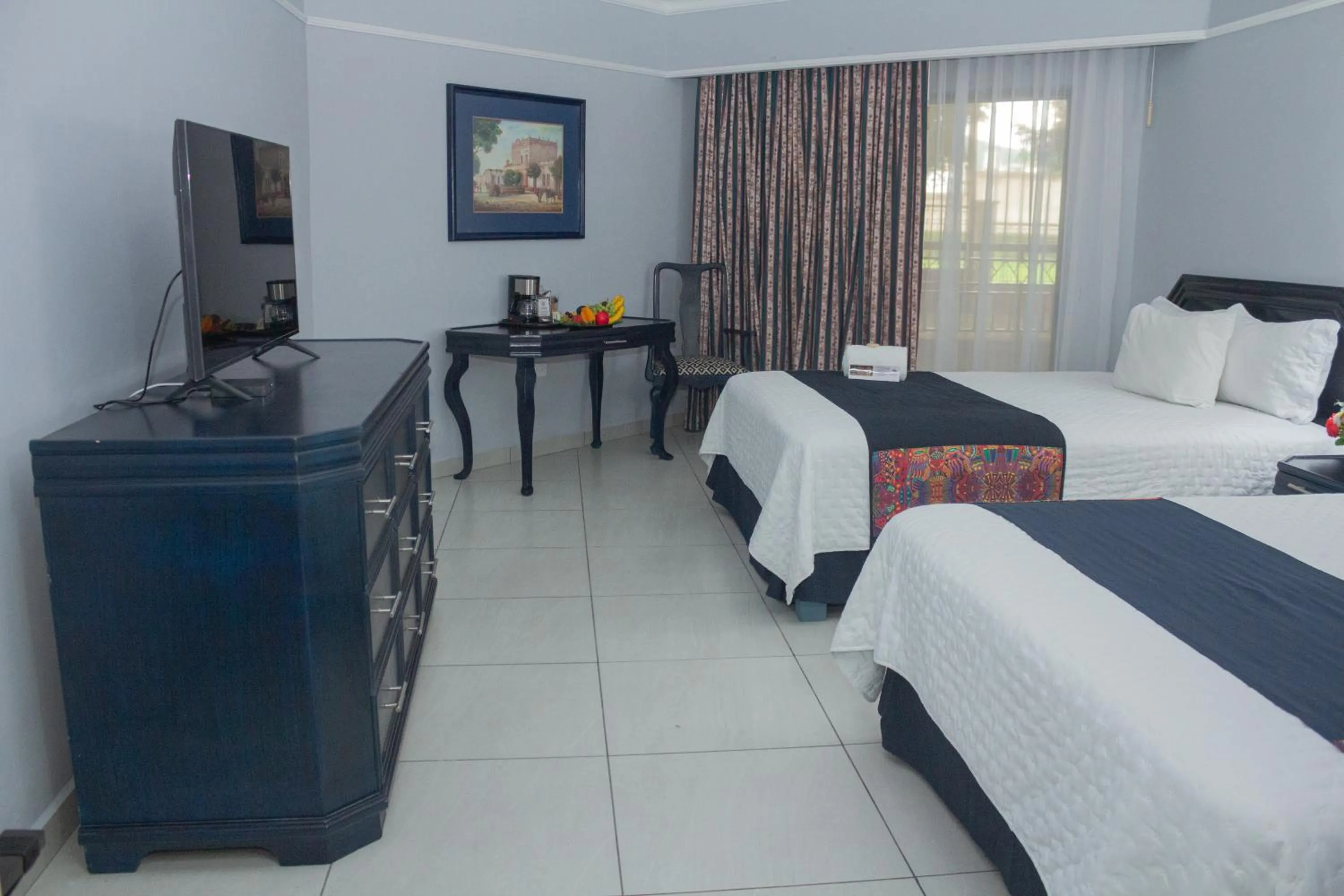 Photo of the whole room, Bed in Nk Hotel Nekié Tepic