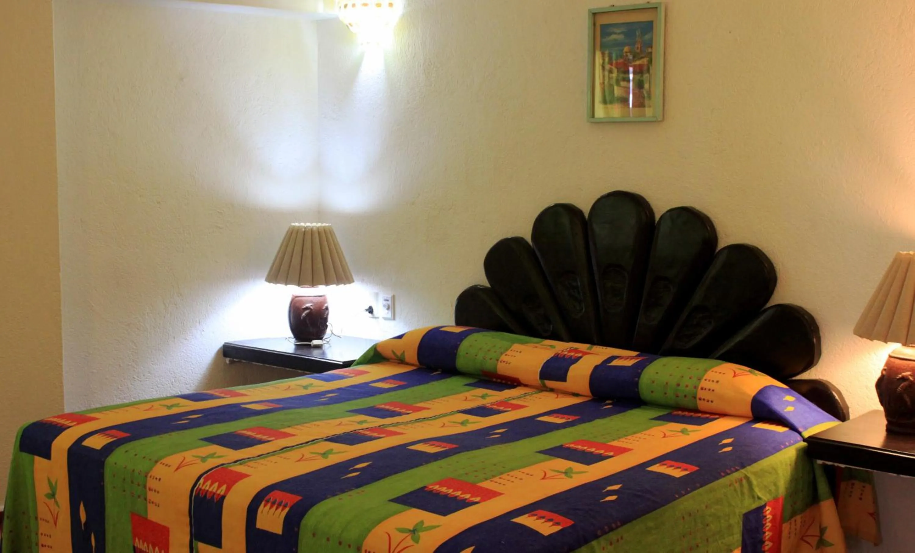 Decorative detail, Bed in Suites Plaza del Rio - Family Hotel Malecón Centro