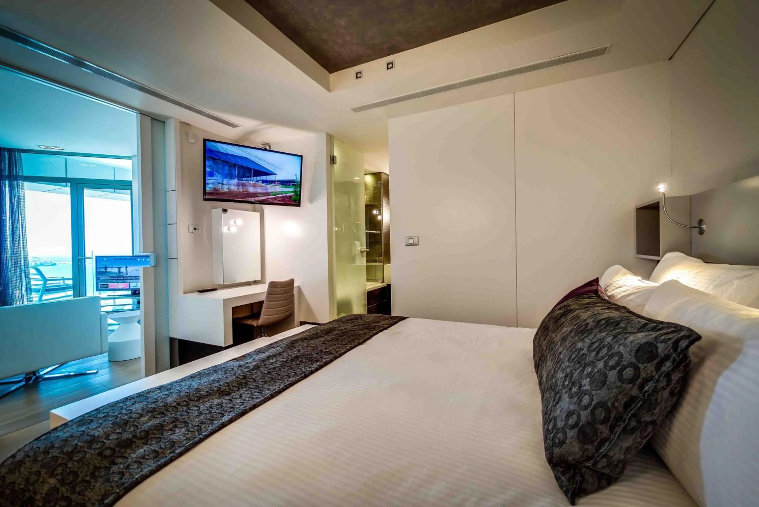 Bed in Royal Beach Hotel Tel Aviv by Isrotel Exclusive