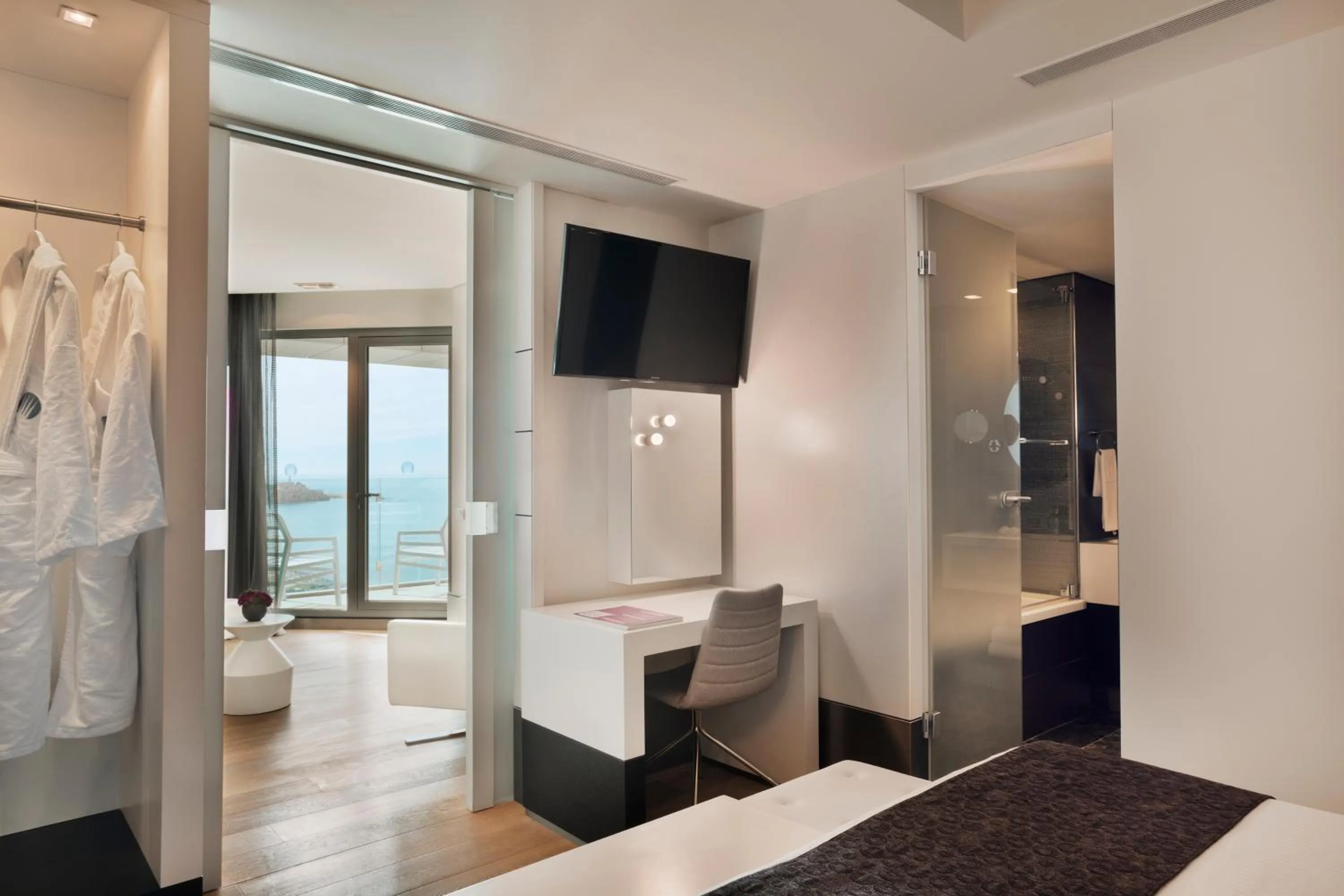 Seating area, Bed in Royal Beach Hotel Tel Aviv by Isrotel Exclusive