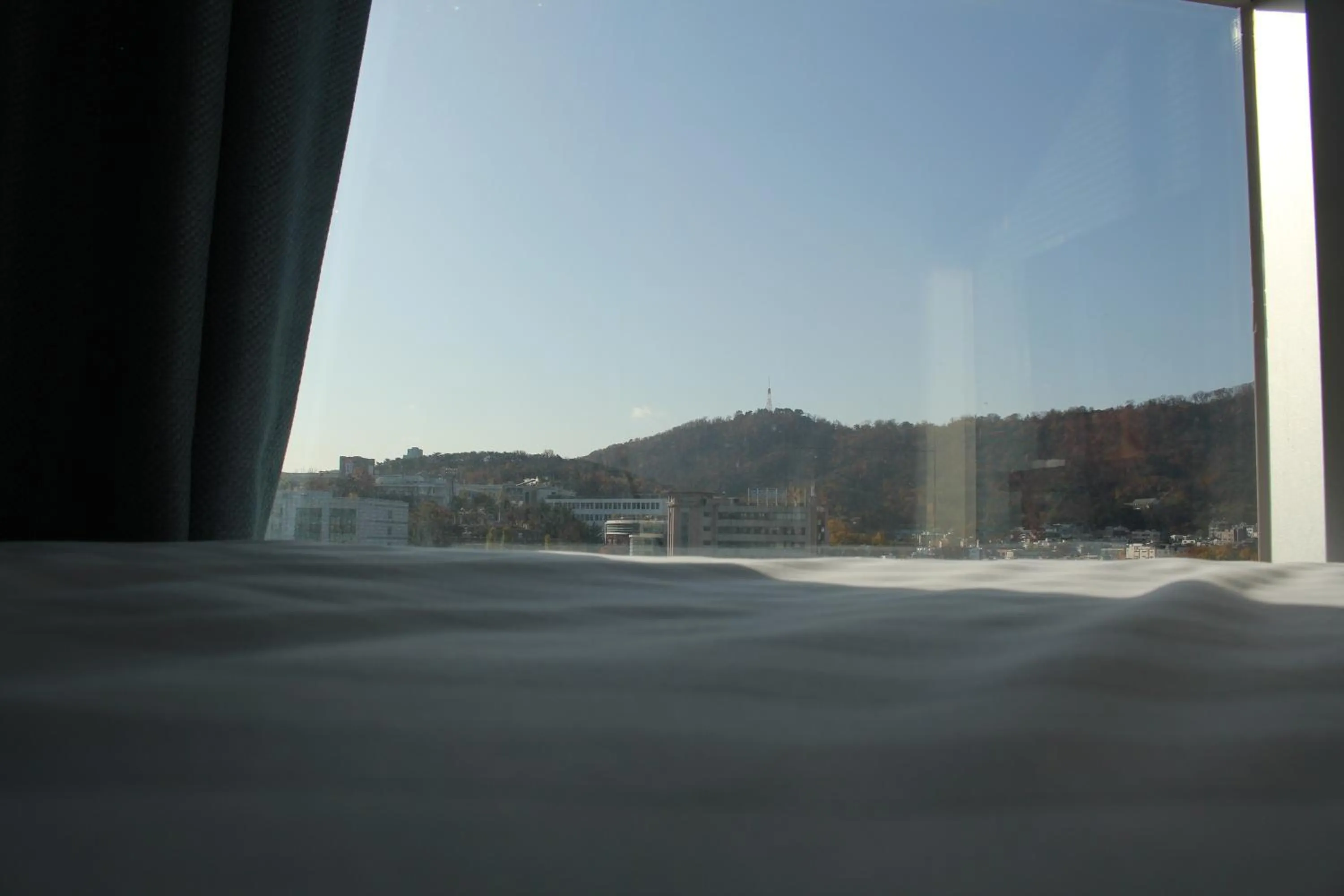 Bed in Myeongdong Merlin Hotel