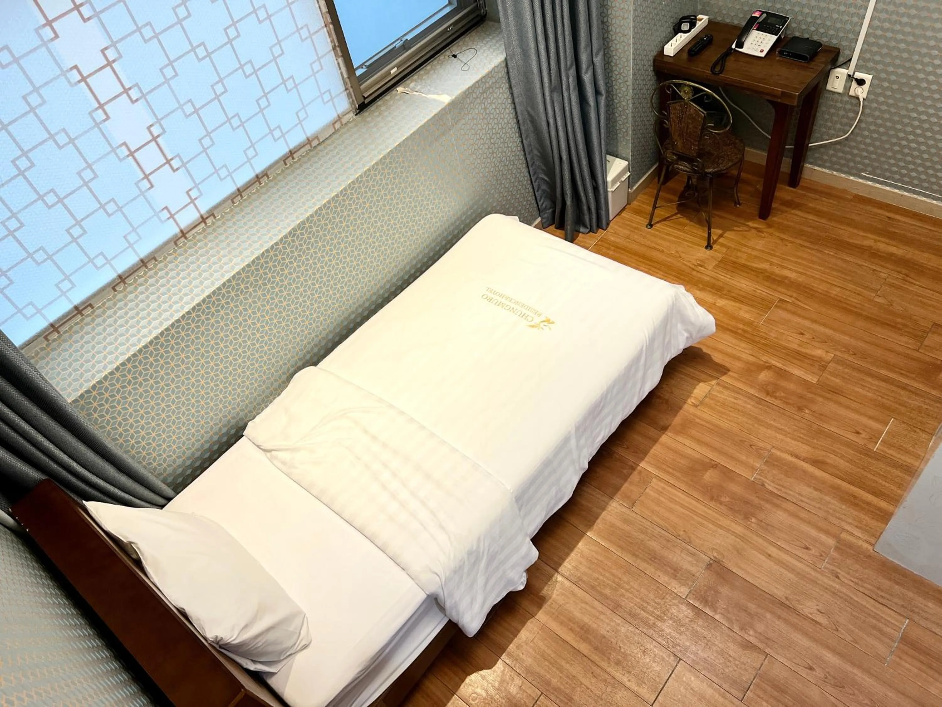 Bed in Myeongdong Merlin Hotel
