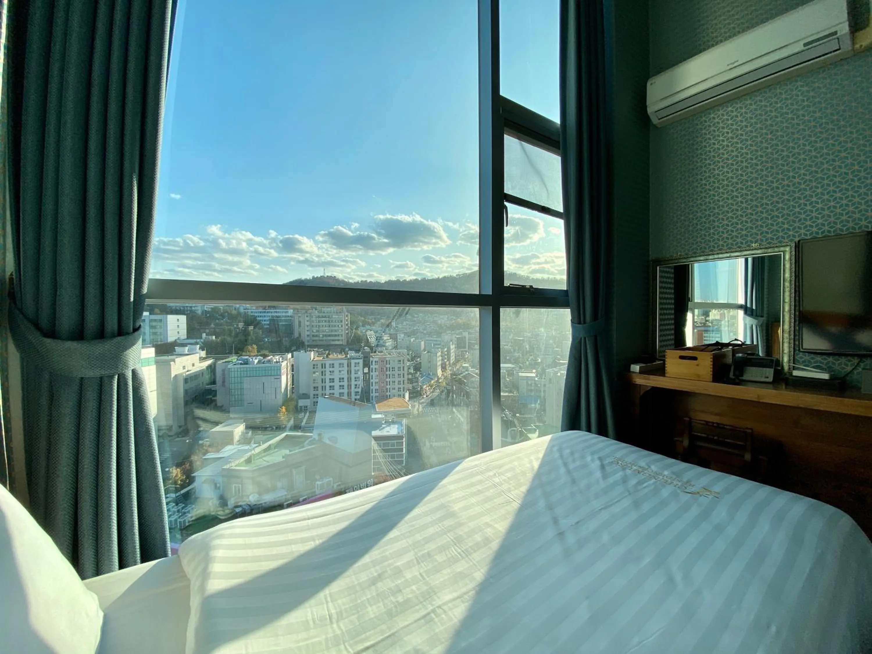 Mountain view, Bed in Myeongdong Merlin Hotel
